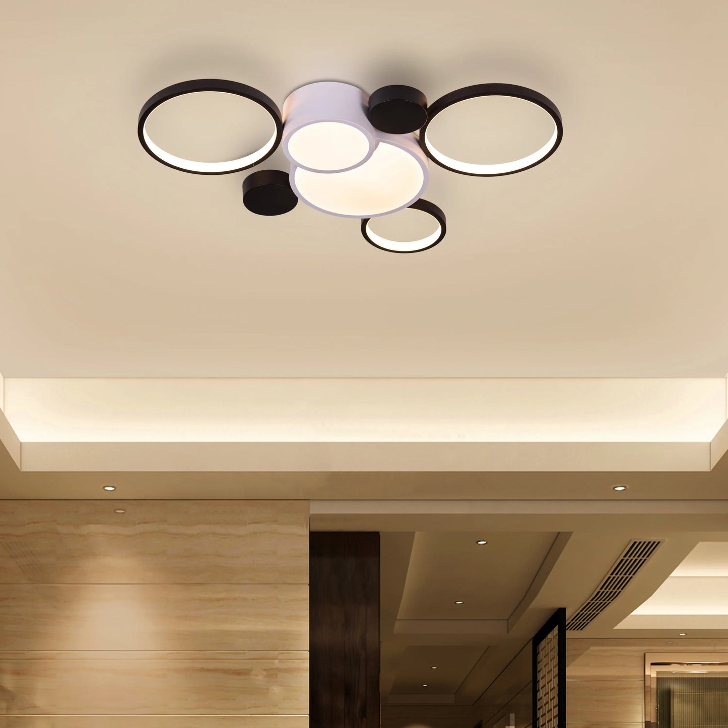 Large white Heat Wave LED ceiling light illuminating a modern living room