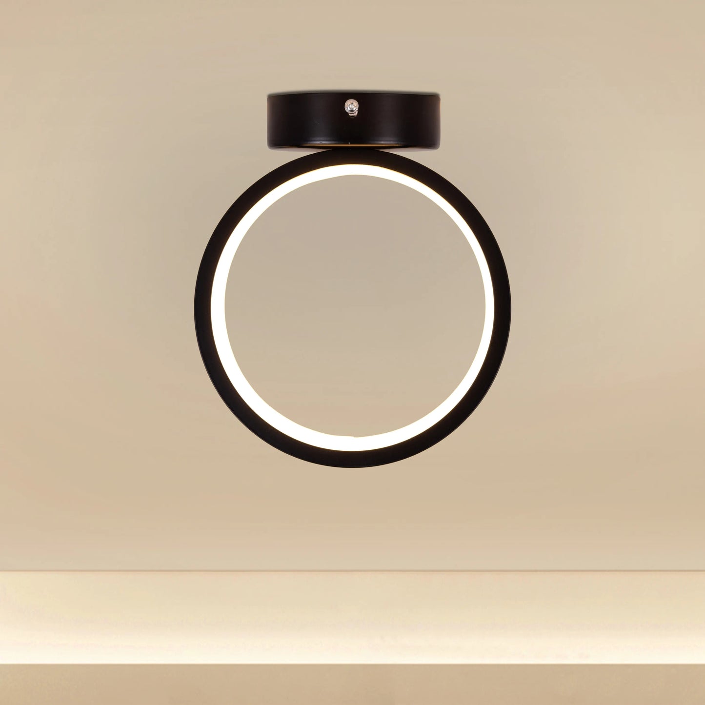 Side view of low-profile Siesta LED ceiling light in black