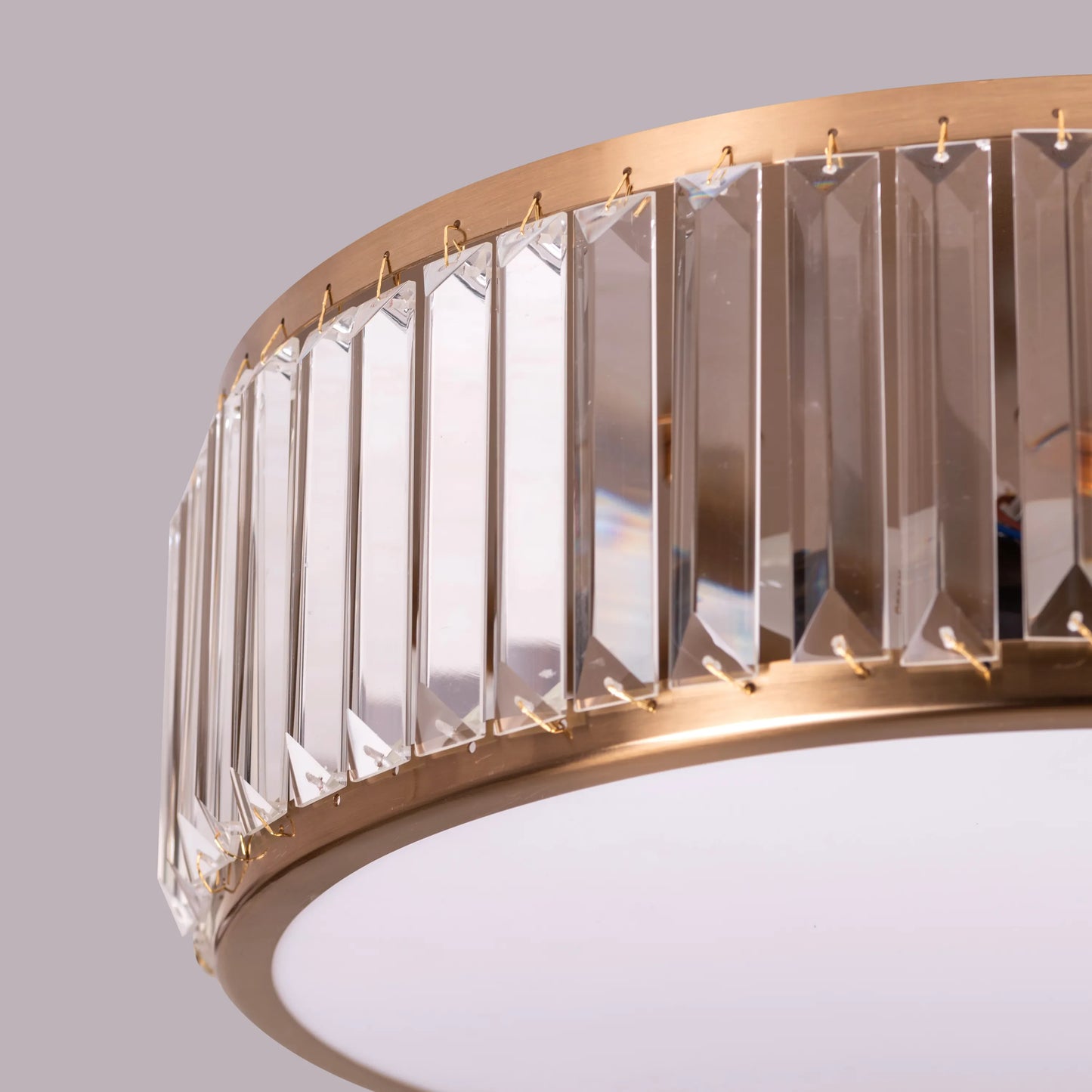 Matinee Gold Crystal Ceiling Light featuring cascading crystal droplets suspended from a circular gold frame, creating a luxurious and sparkling illumination for elegant spaces.