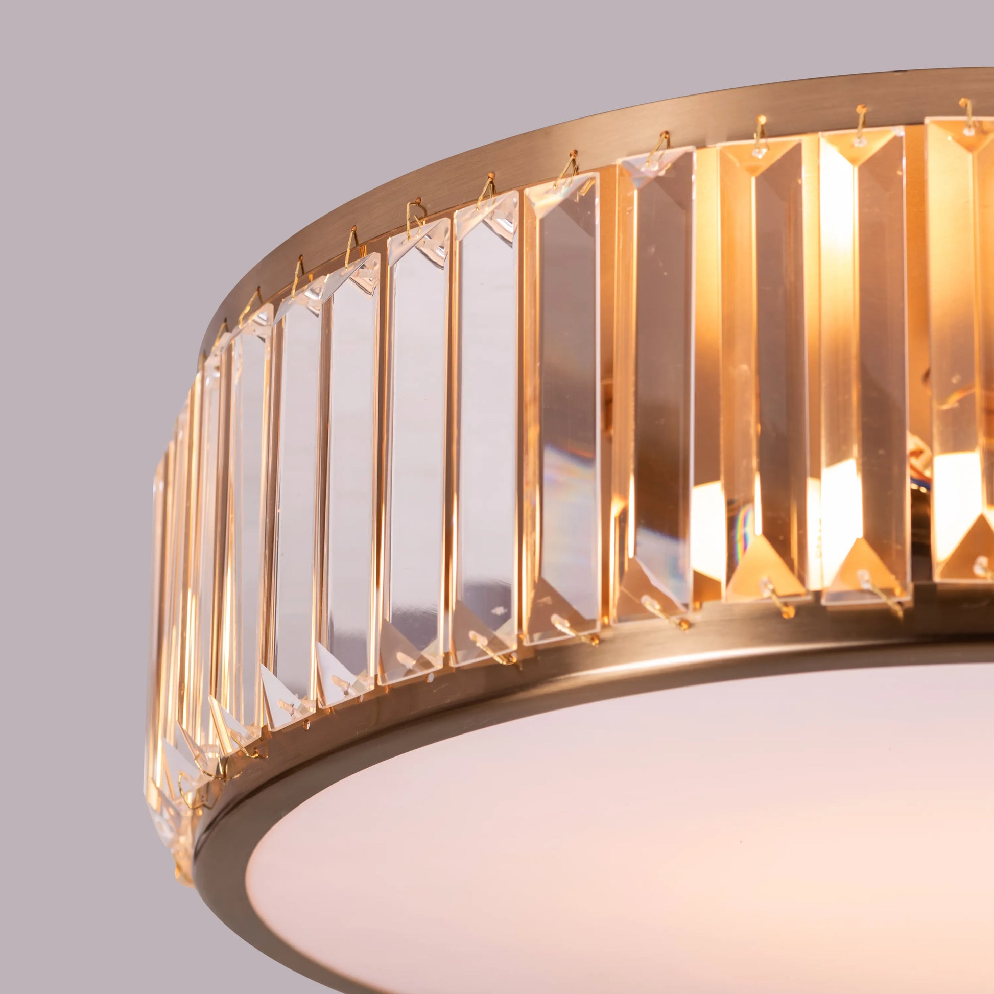 Matinee Gold Crystal Ceiling Light featuring cascading crystal droplets suspended from a circular gold frame, creating a luxurious and sparkling illumination for elegant spaces.