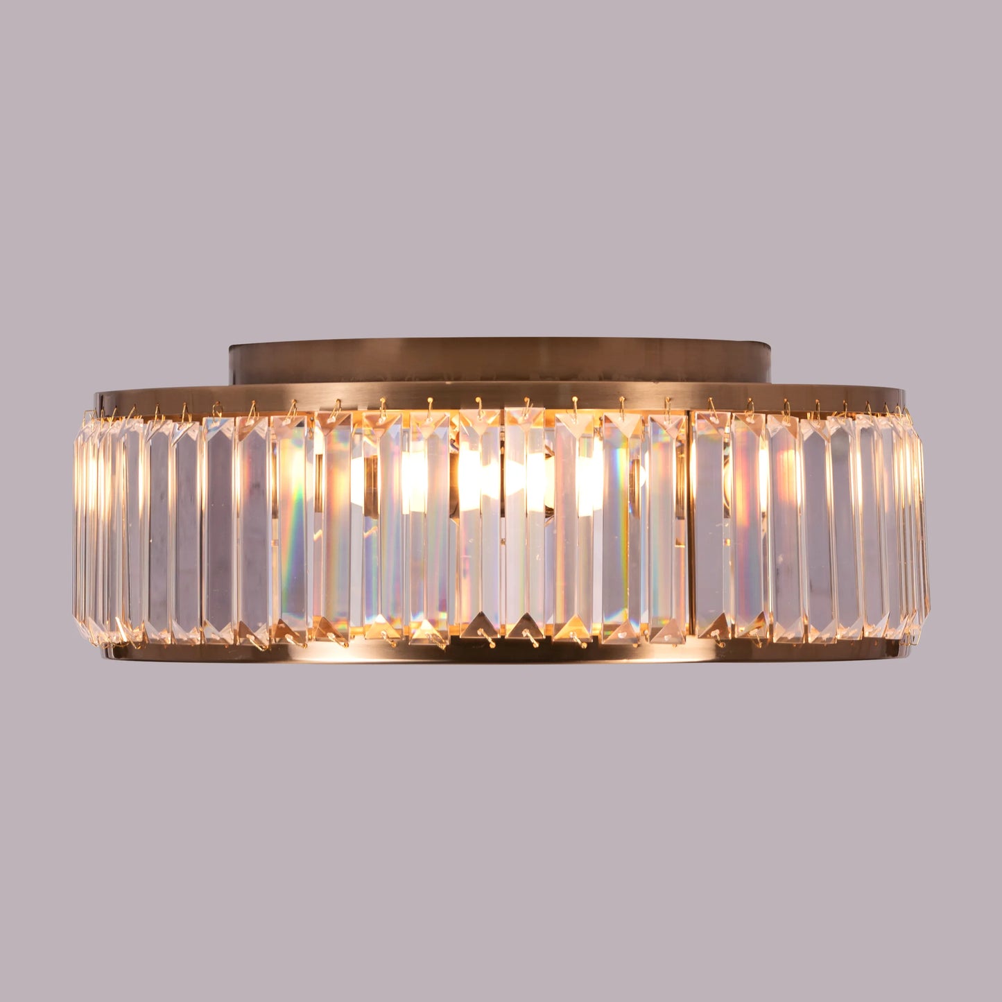 Matinee Gold Crystal Ceiling Light featuring cascading crystal droplets suspended from a circular gold frame, creating a luxurious and sparkling illumination for elegant spaces.