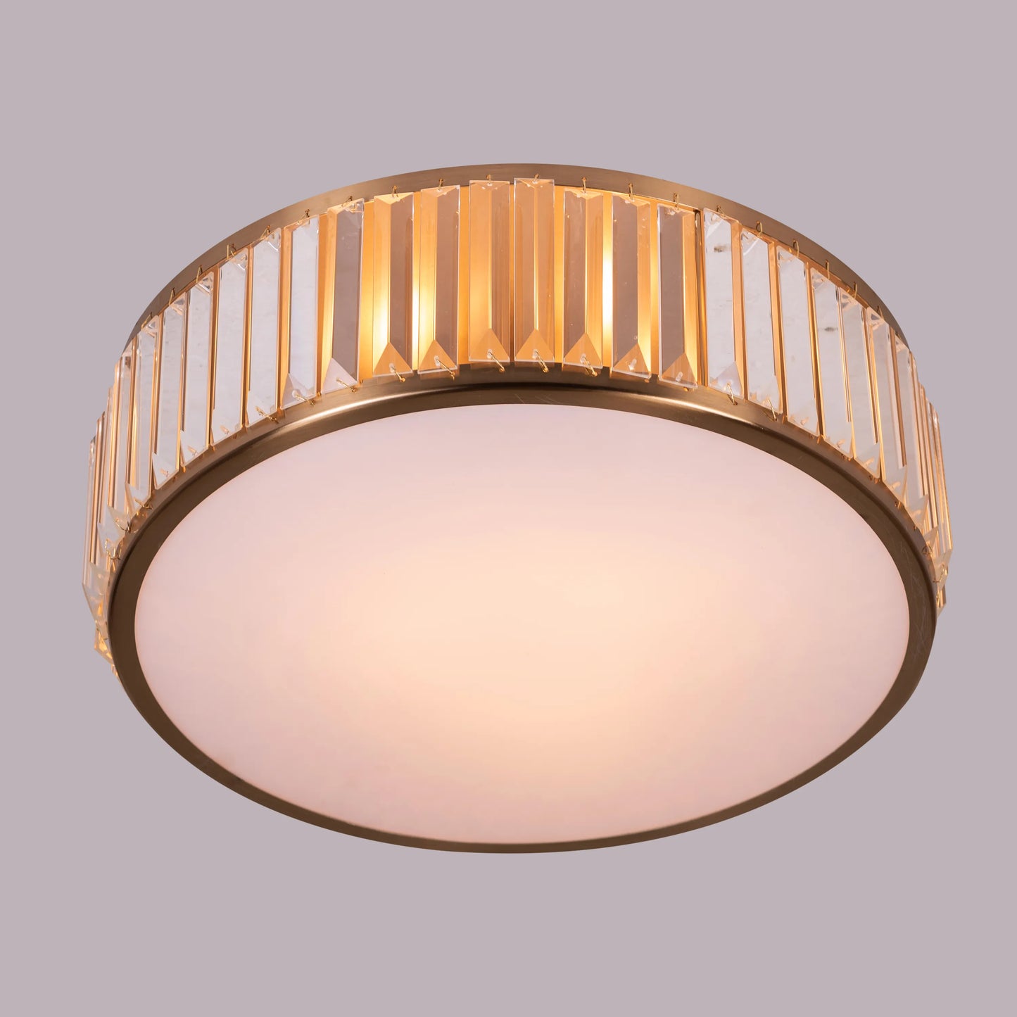 Matinee Gold Crystal Ceiling Light featuring cascading crystal droplets suspended from a circular gold frame, creating a luxurious and sparkling illumination for elegant spaces.