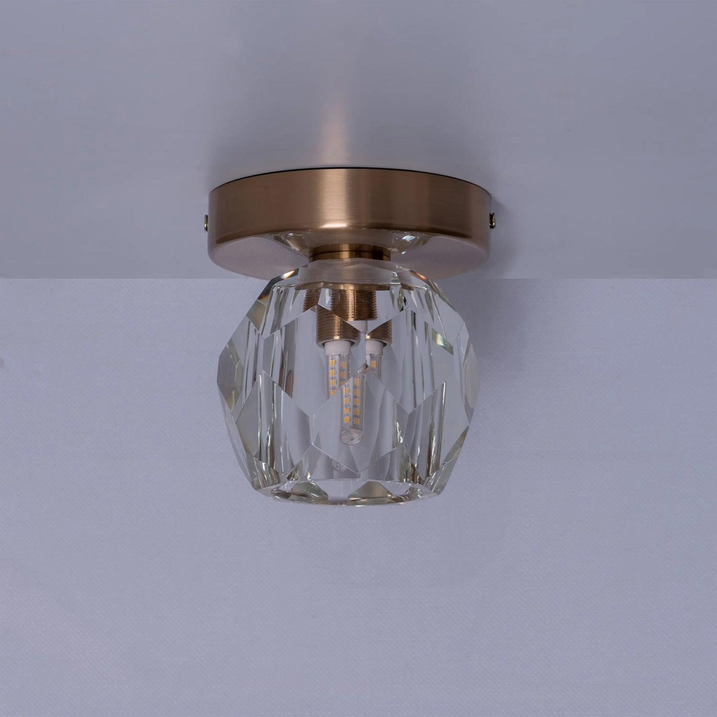 White Diamond Ceiling Light featuring a geometric, faceted design inspired by cut diamonds, with a pristine white finish that creates a luxurious and brilliantly reflective illumination for sophisticated spaces.