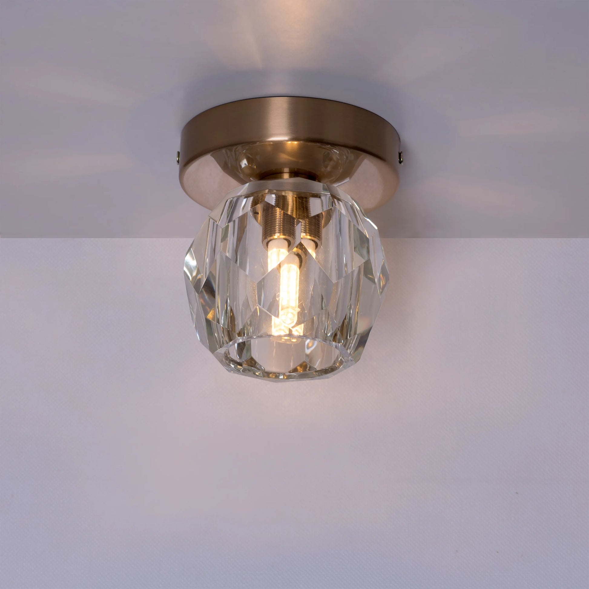 White Diamond Ceiling Light featuring a geometric, faceted design inspired by cut diamonds, with a pristine white finish that creates a luxurious and brilliantly reflective illumination for sophisticated spaces.