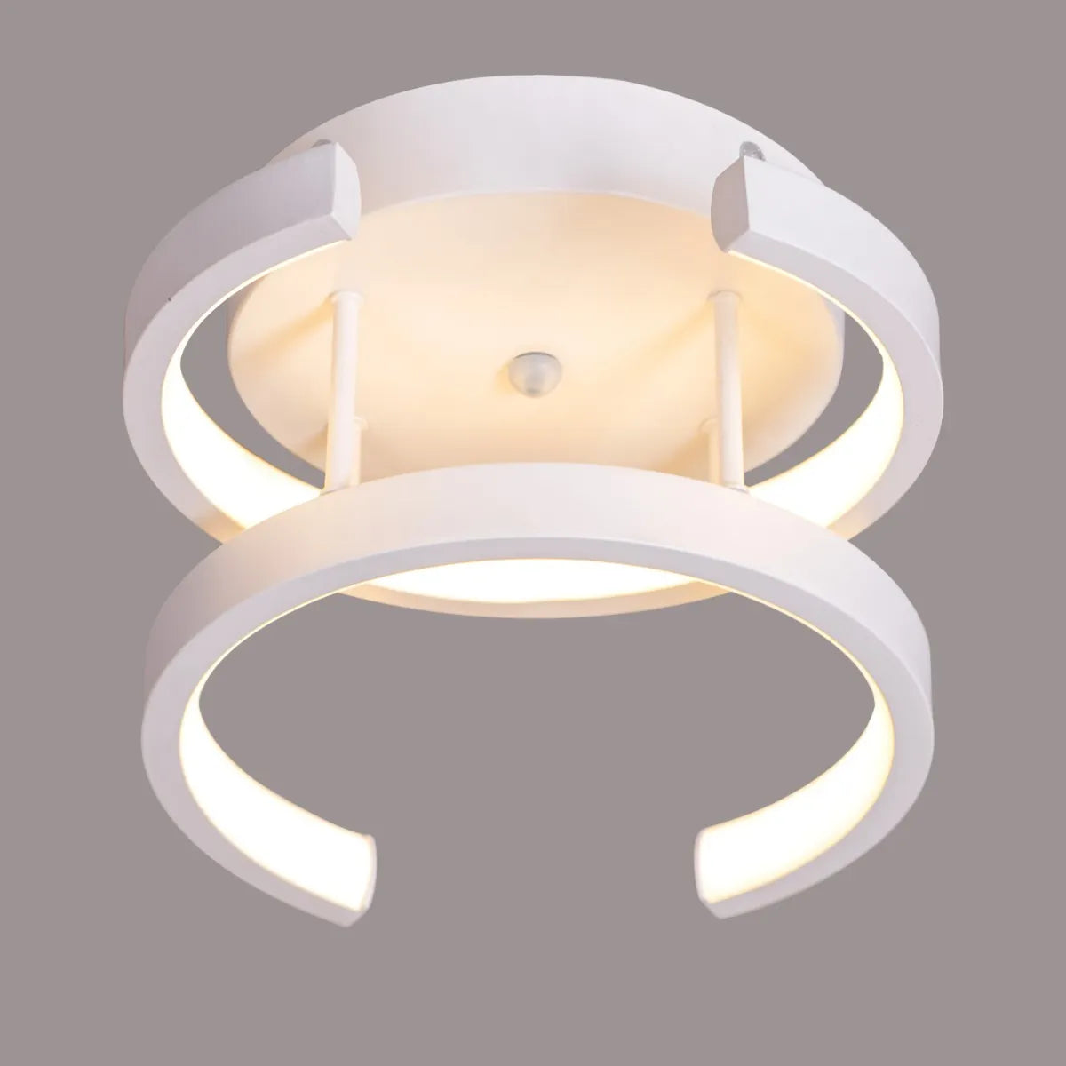 Sleek white ceiling light with adjustable LED colors.