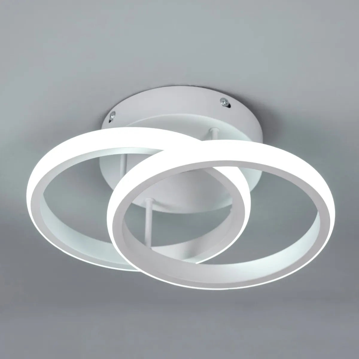 Contemporary ceiling light with remote-controlled brightness.