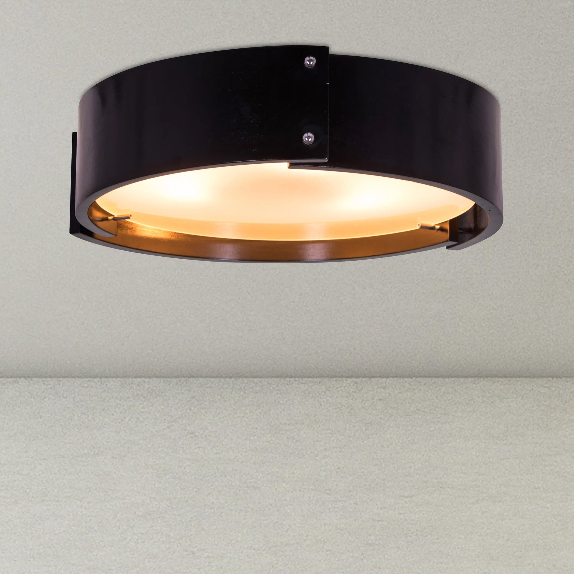 Swiss Chalet Ceiling Light creating a warm glow in a modern living room