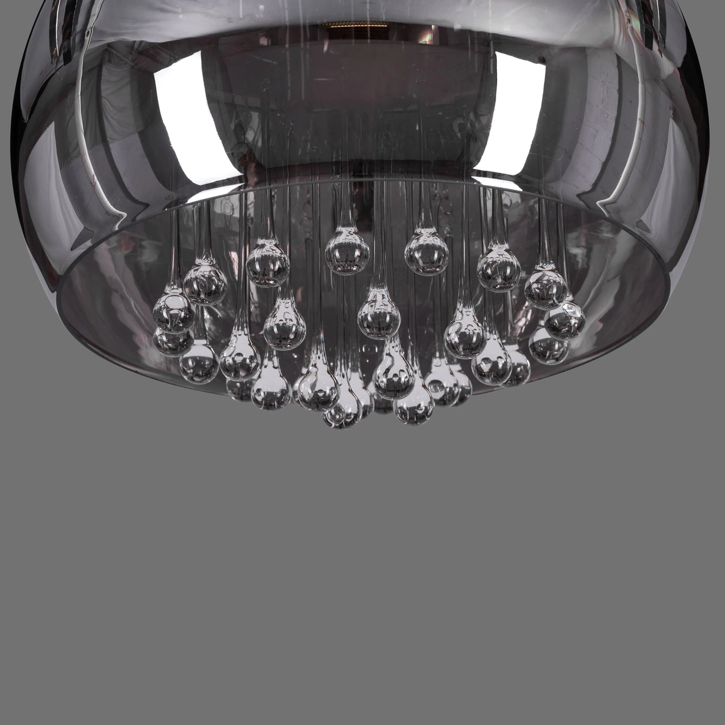 Luxurious chandelier with smokey grey crystal accents.