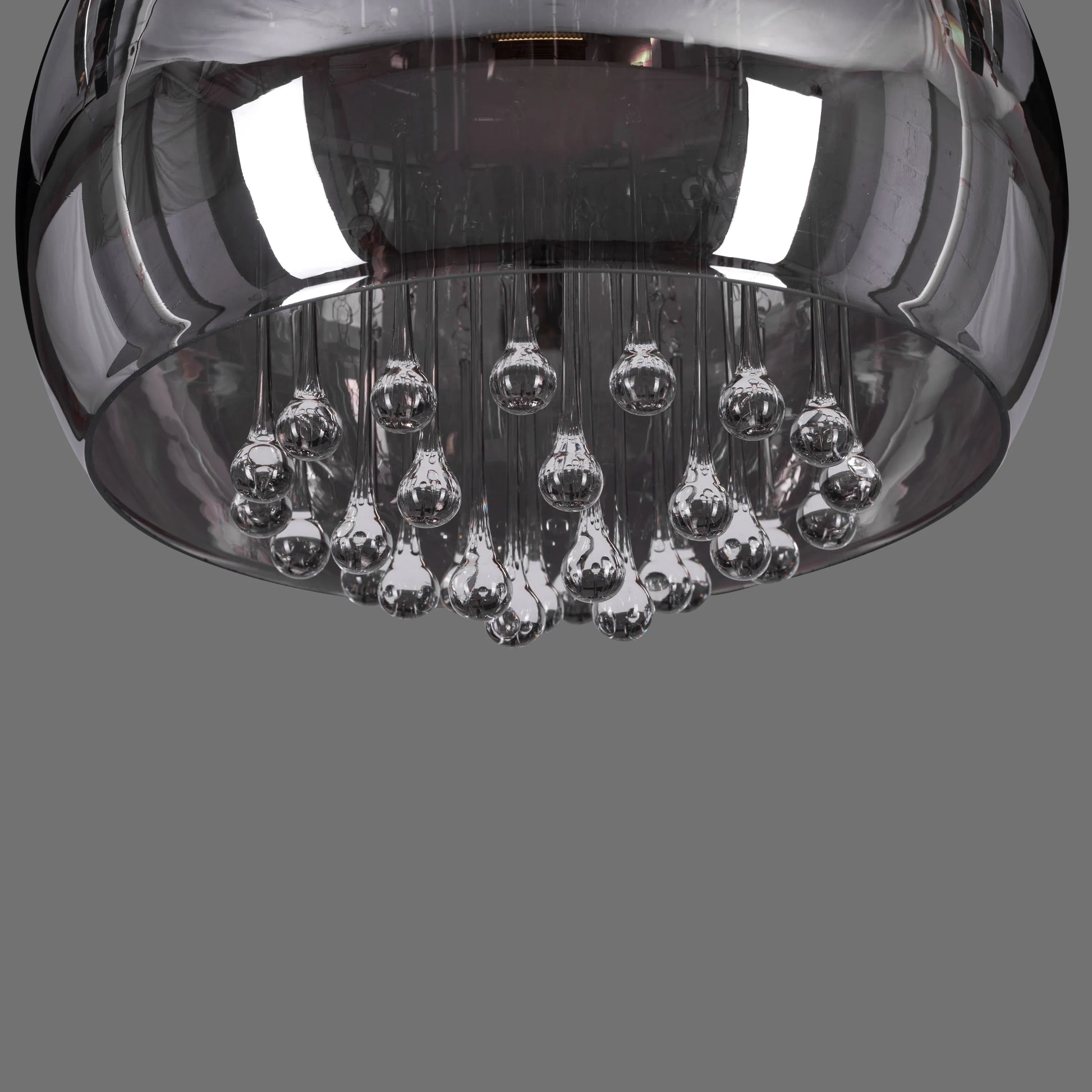 Luxurious chandelier with smokey grey crystal accents.