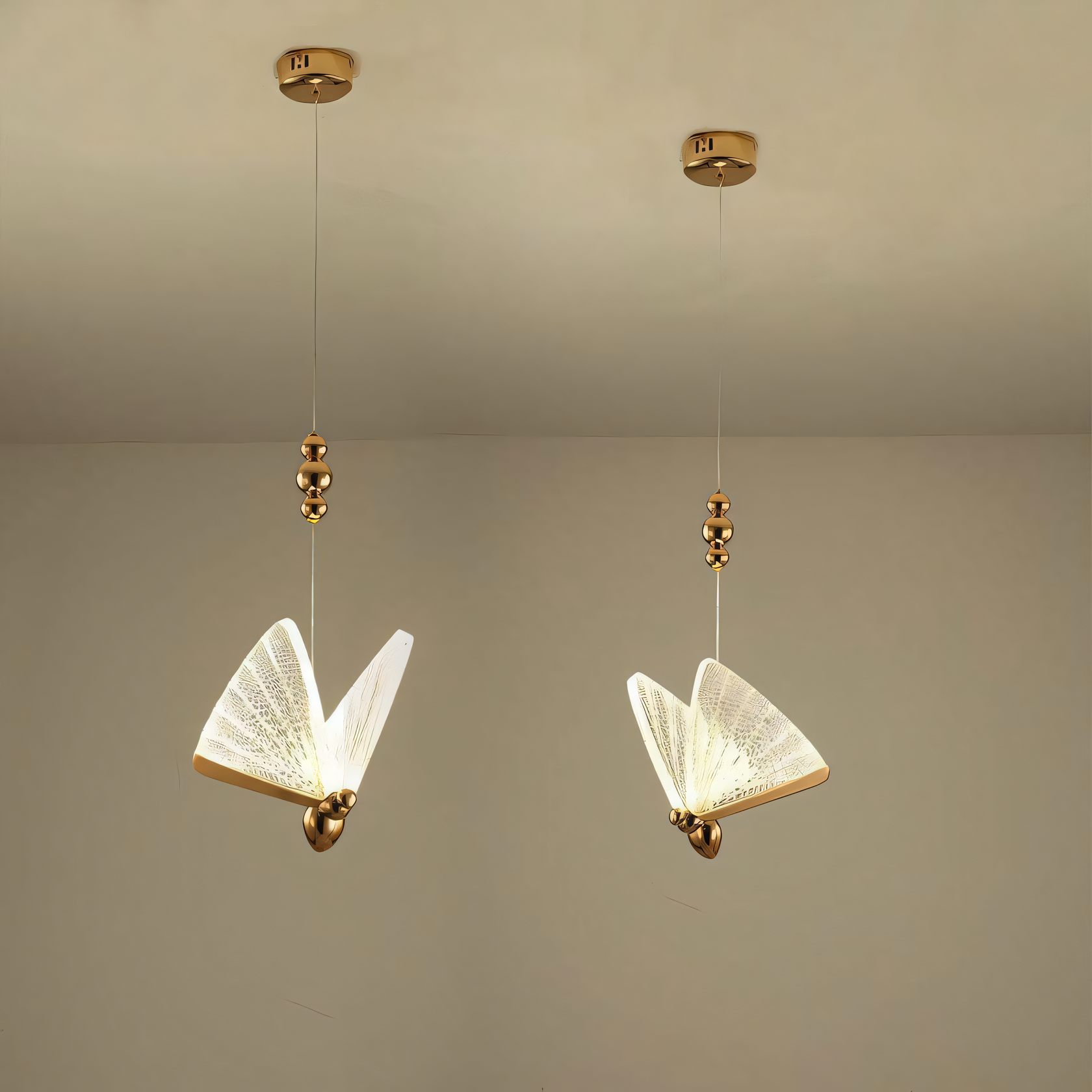 Delicate and graceful hanging light fixture with a butterfly design