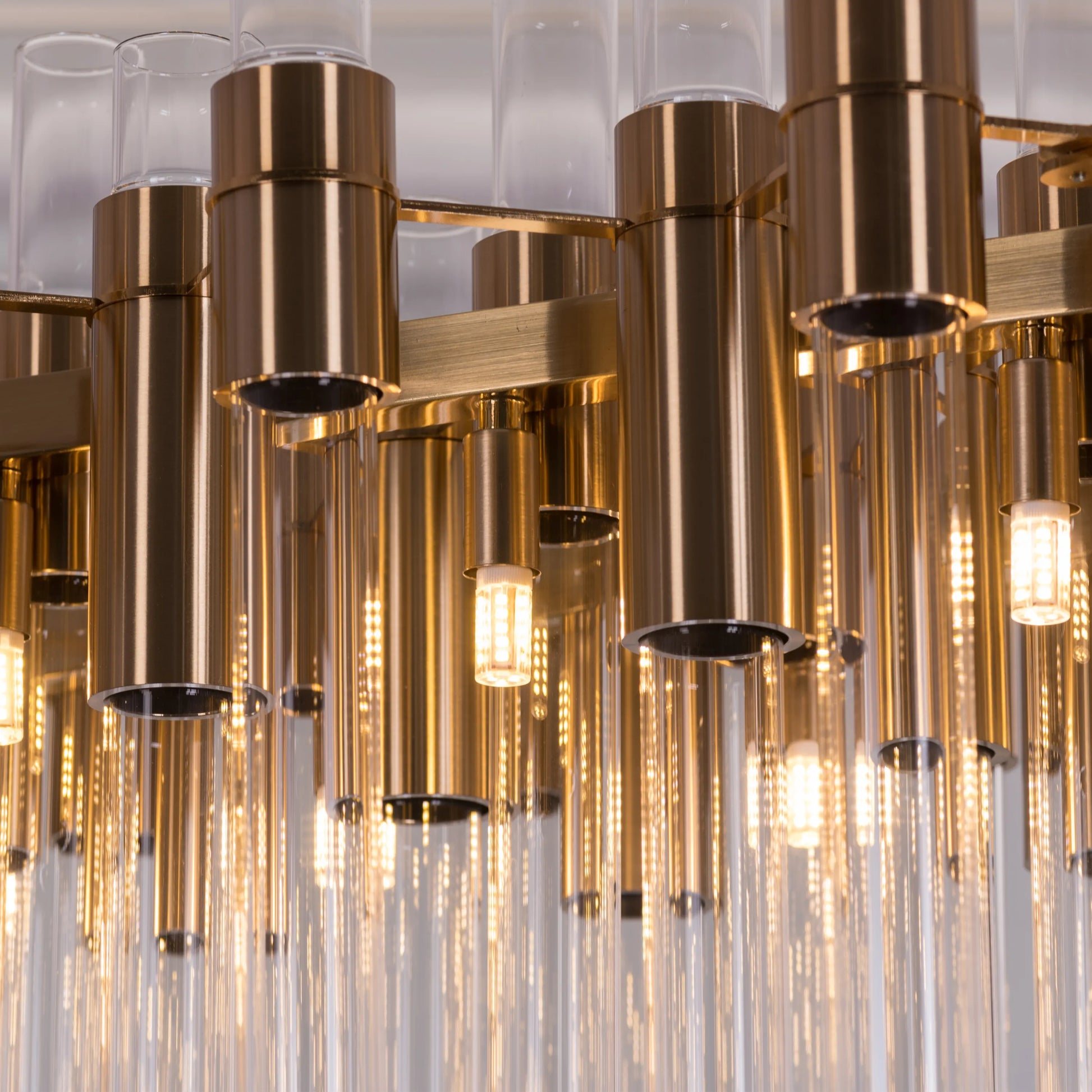 Luxurious gold-finished glass tube chandelier with dazzling LED lighting