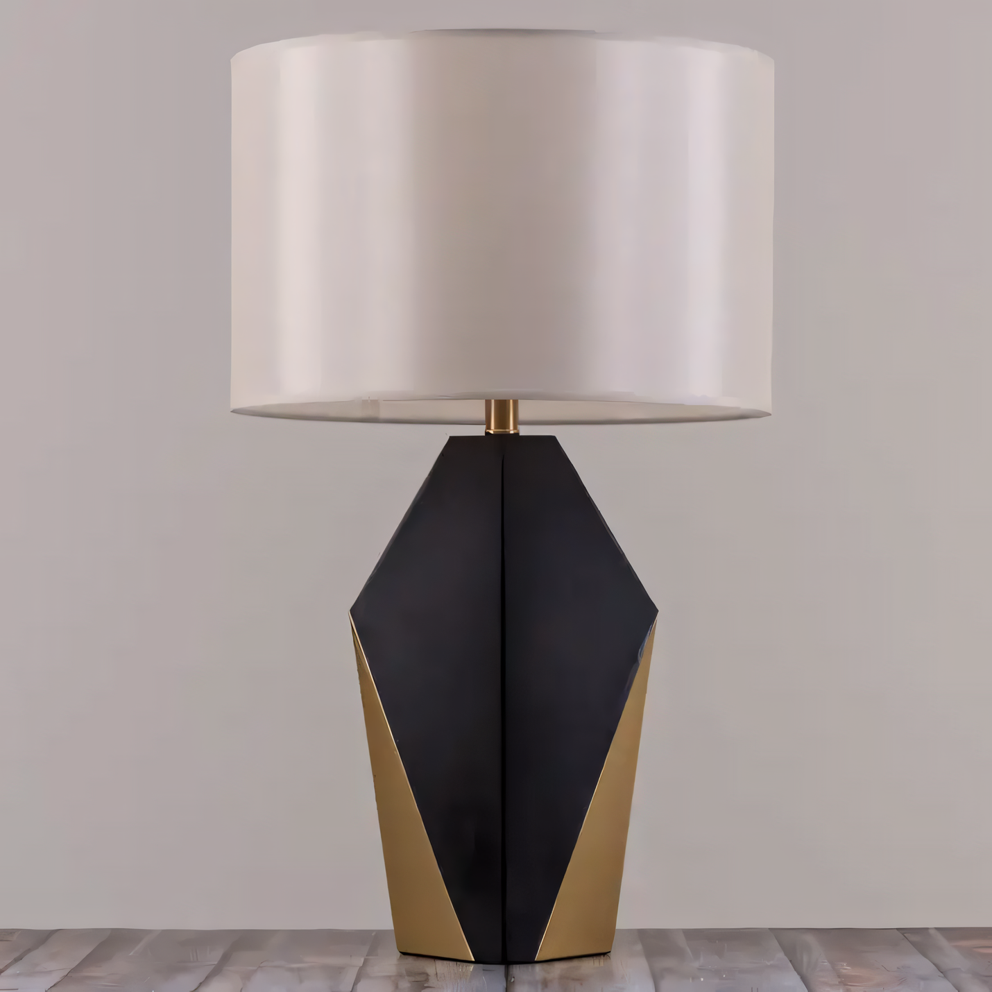 Fabric shade of the Checklist (Black, Gold) Ceramic Table Lamp, creating a warm, diffused glow