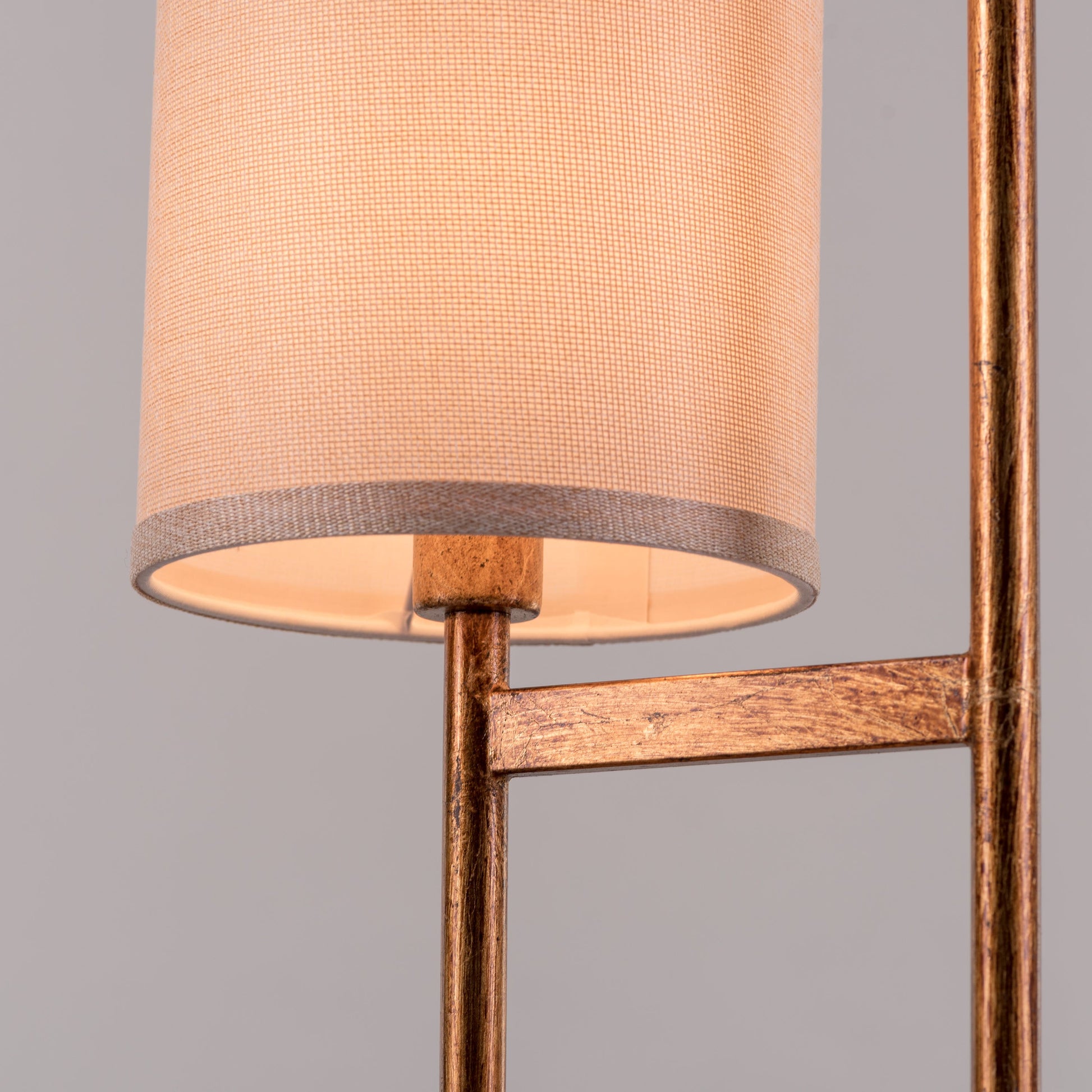 Twin tower-inspired gold and marble lamp design