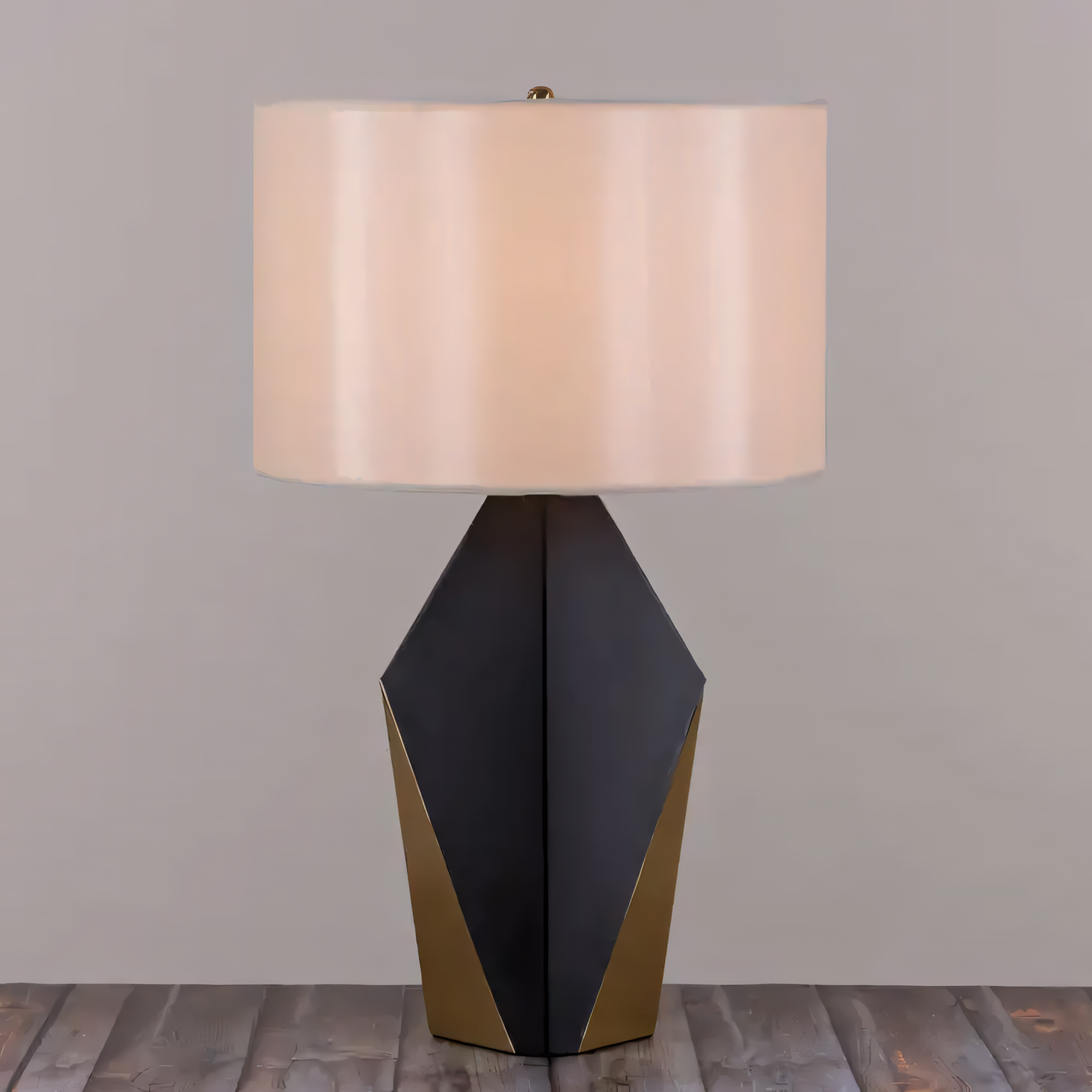 Fabric shade of the Checklist (Black, Gold) Ceramic Table Lamp, creating a warm, diffused glow