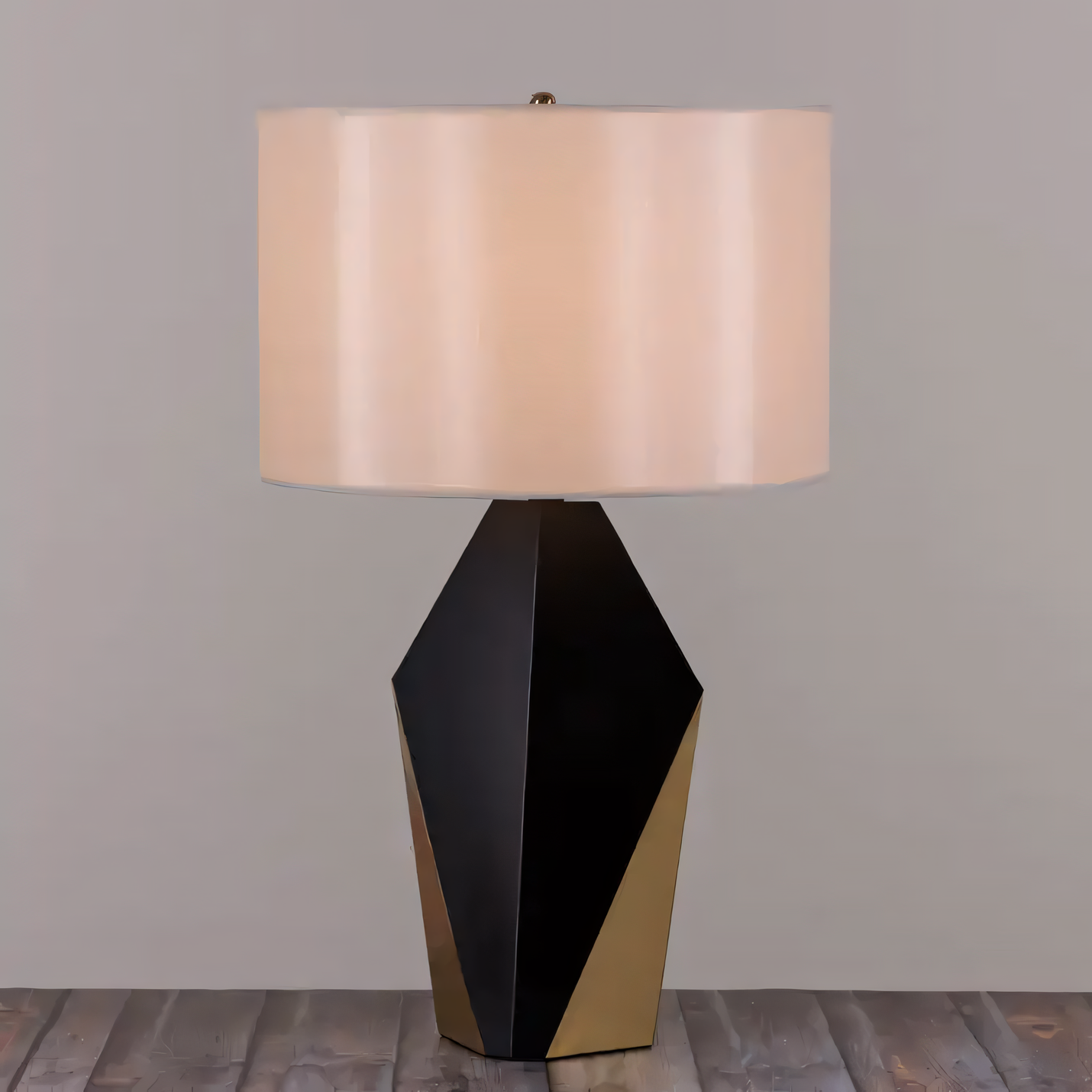 Sleek, round shape of the Checklist (Black, Gold) Ceramic Table Lamp