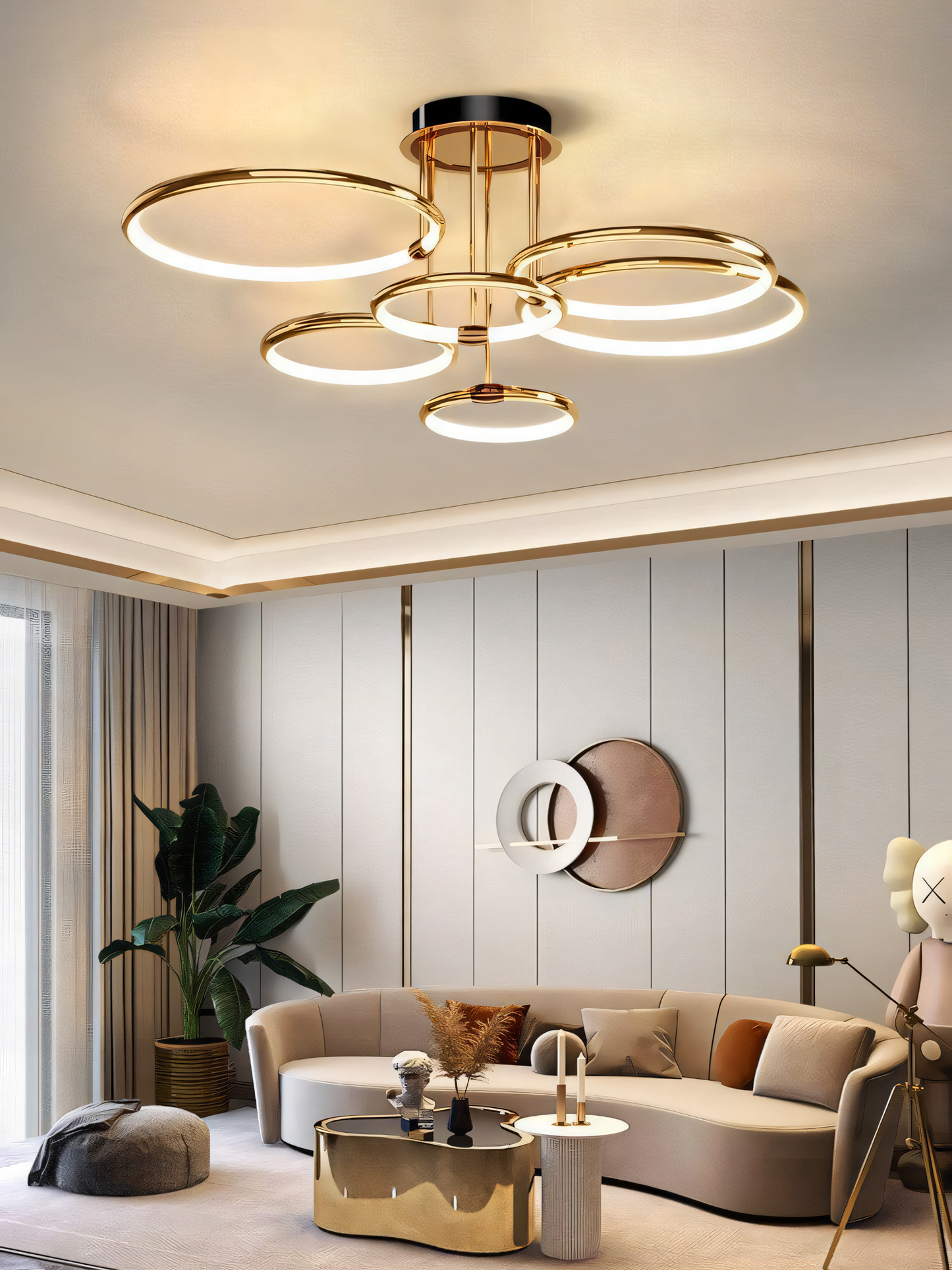 This gold LED chandelier boasts a modern ring design, casting a warm and inviting light to elevate the ambiance of any space.