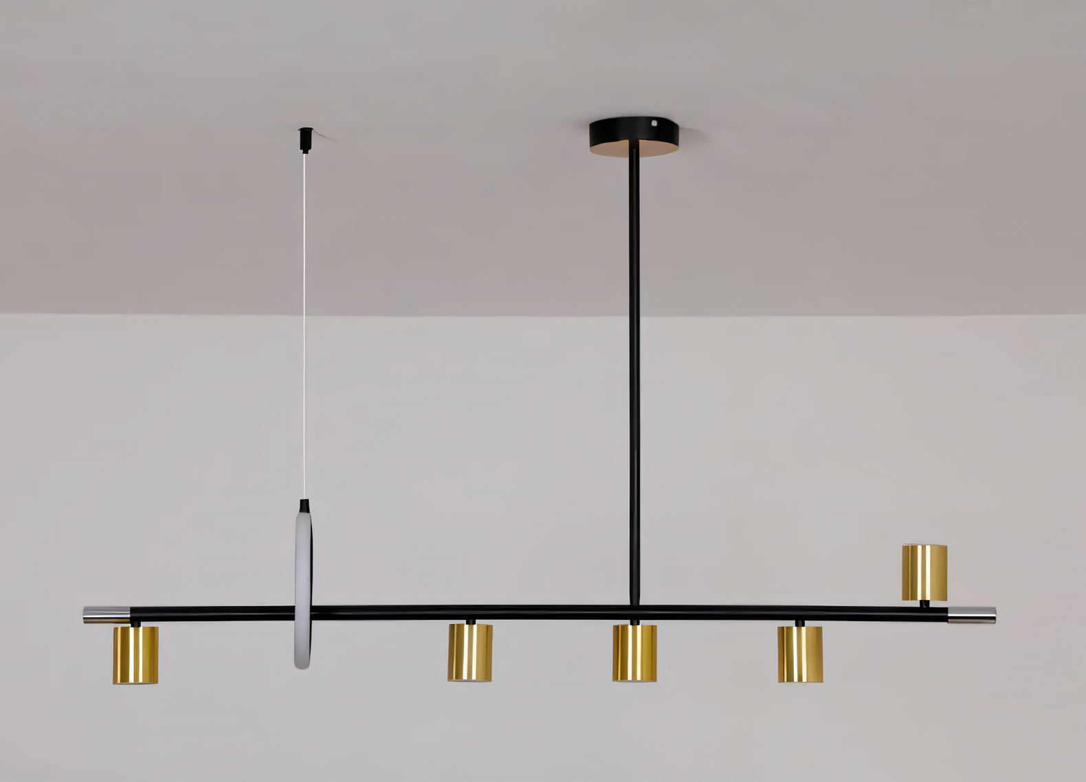 This black and gold chandelier boasts a modern linear design with adjustable spotlights, perfect for illuminating your living room or dining room.