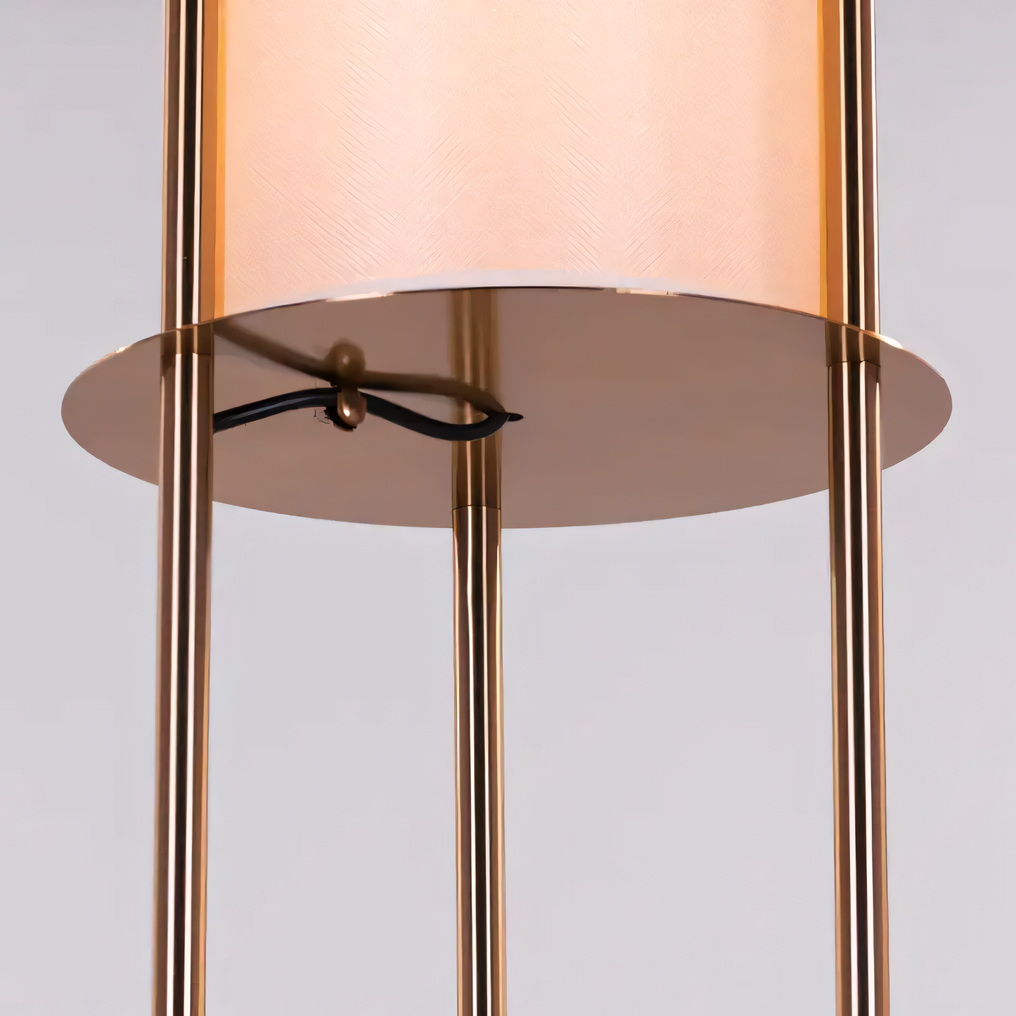 Timeless and sophisticated gold floor lamp with functional shelf