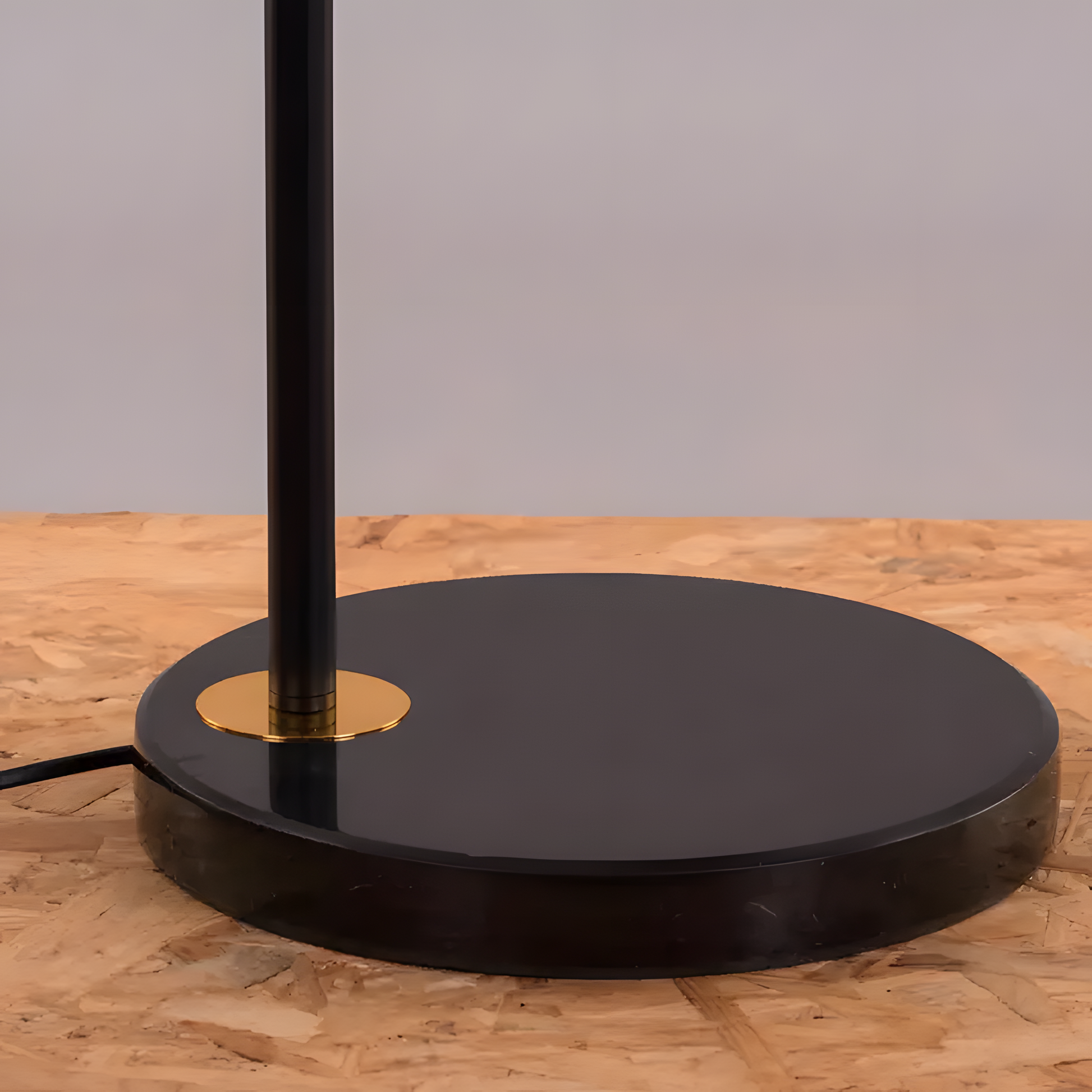 Black metal floor lamp with marble base