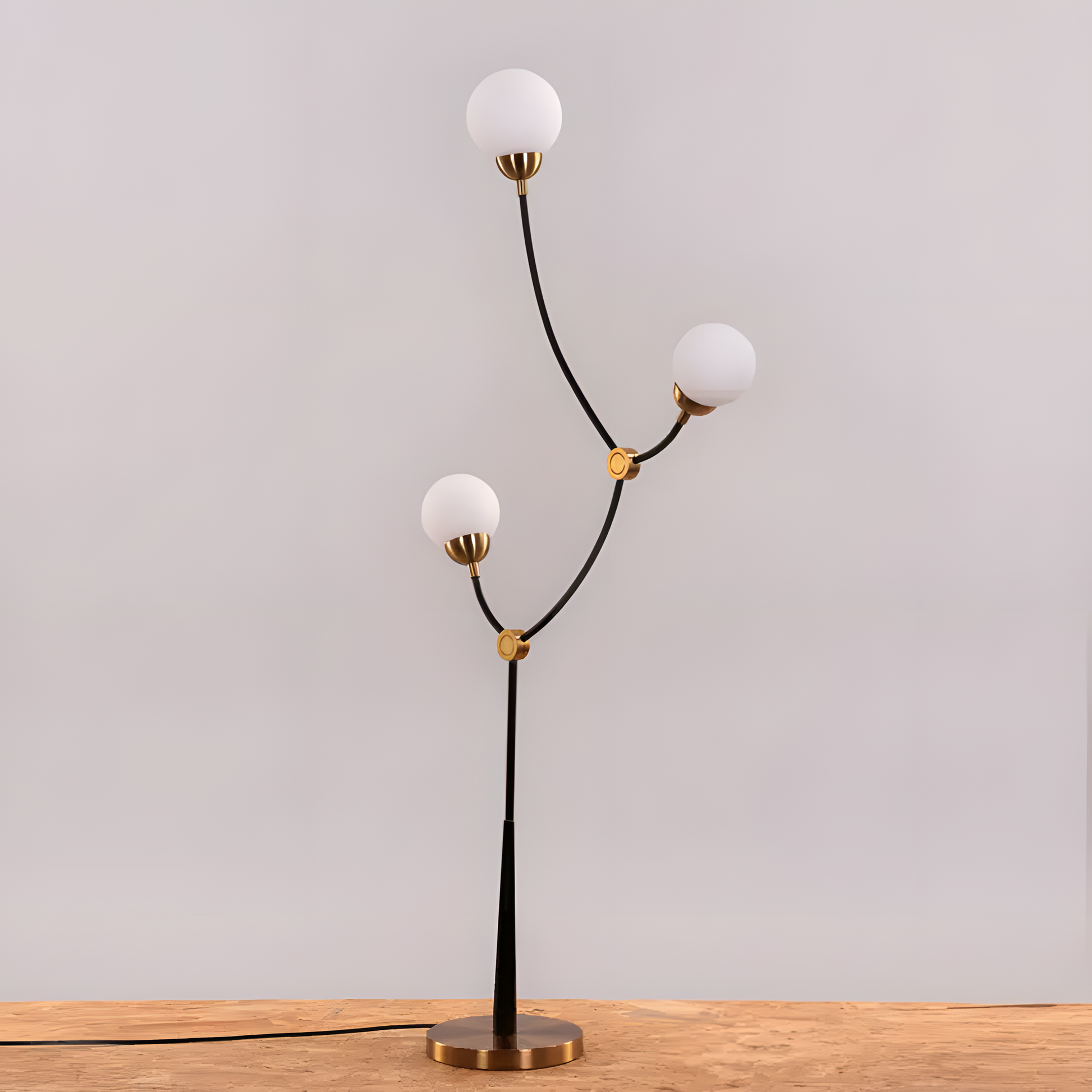 Striking, white glass globe of the I Owe You (Short) Floor Lamp