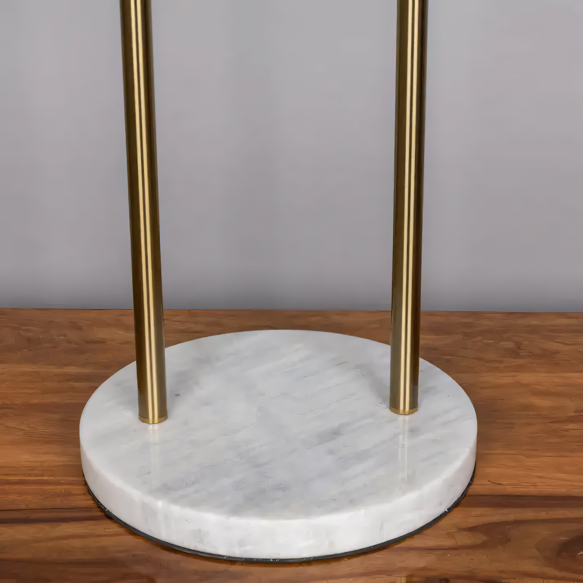 Warm and inviting glow from the Take A Trip (Gold) Marble Lamp