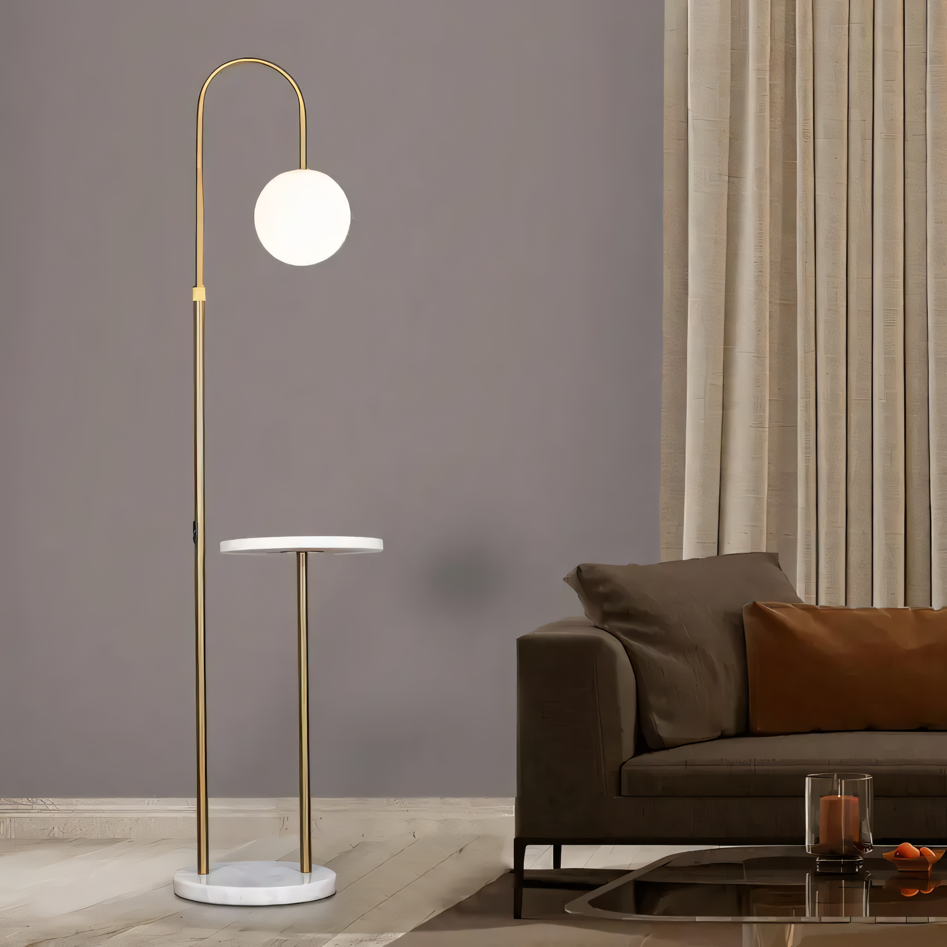 Gleaming gold metal frame of the Take A Trip (Gold) Marble Lamp