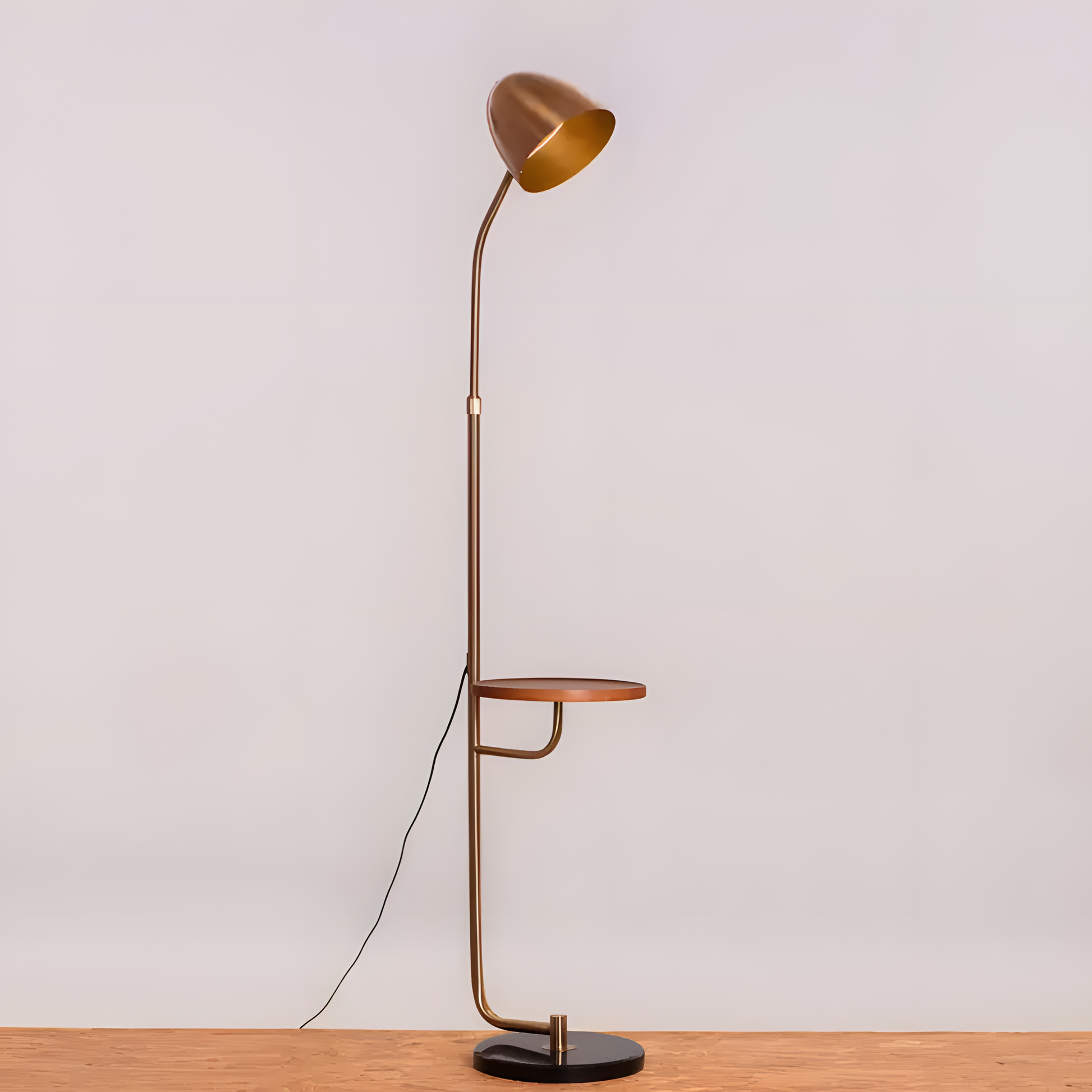 Contrasting black marble base of the In My Mind (Gold, White) Floor Lamp