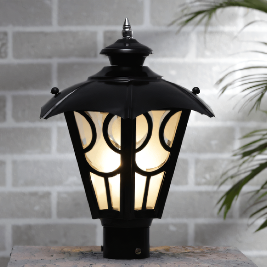 Sleek black metal gate light in a luxurious, stately setting