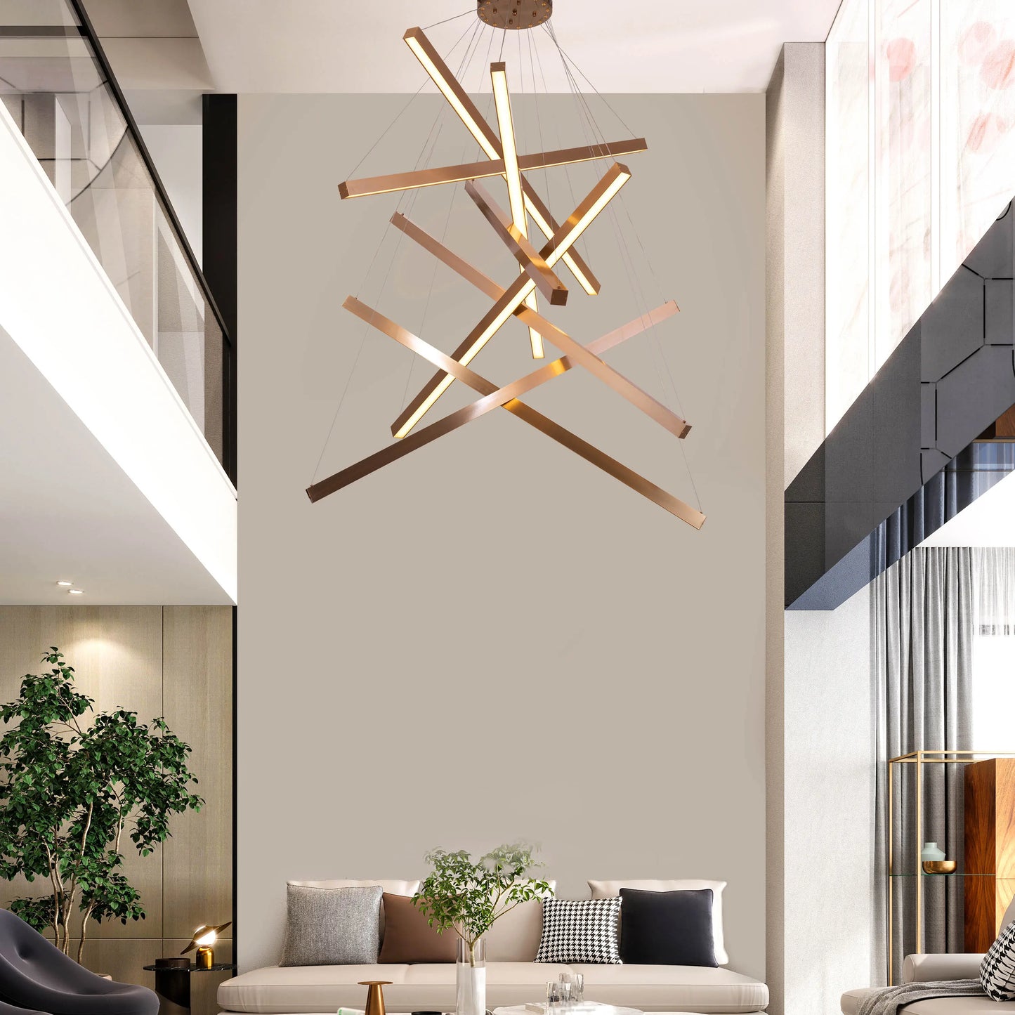 Large gold Toast To Tomorrow chandelier with double-height design illuminating a luxurious living room