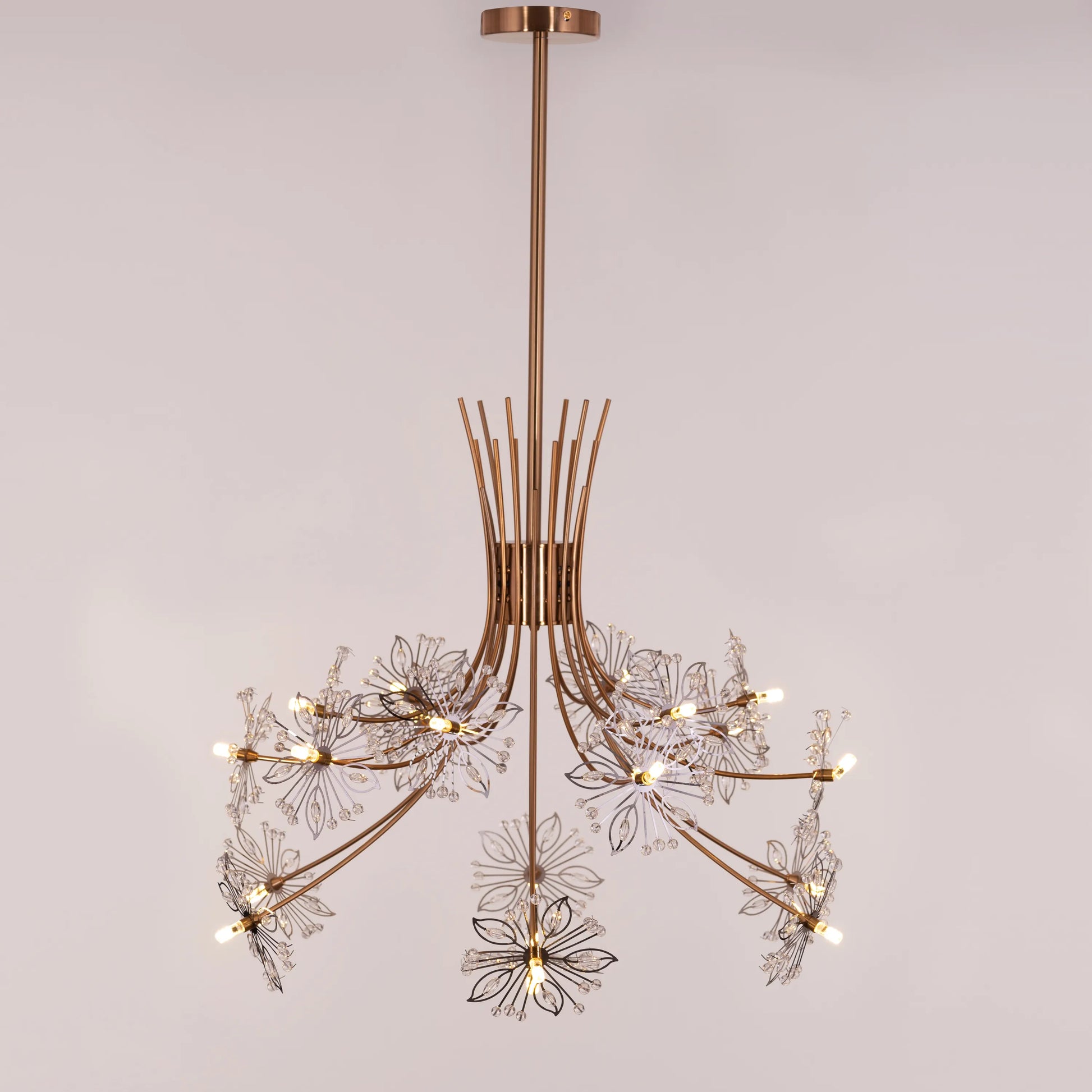 Elegant gold and crystal chandelier with cascading glass droplets