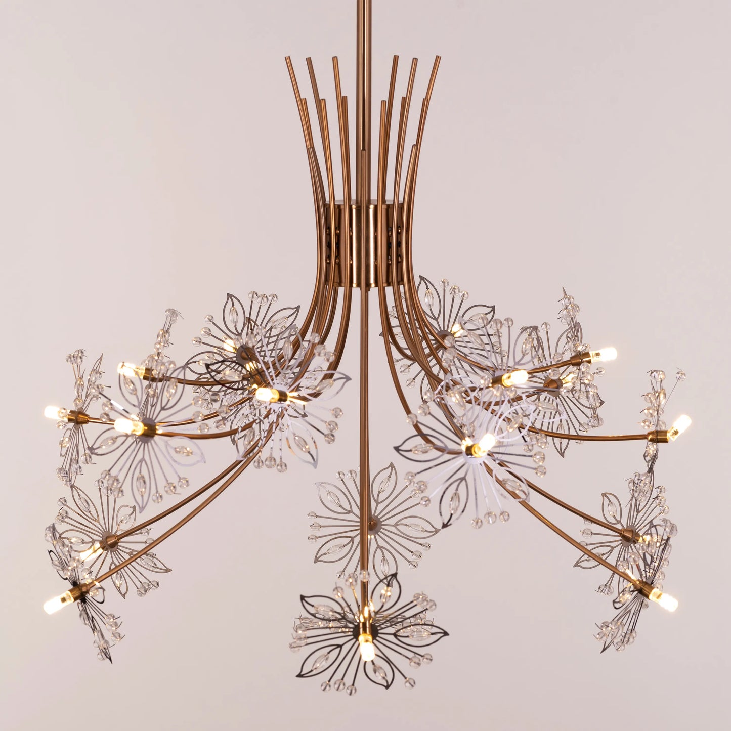 Elegant gold and crystal chandelier with cascading glass droplets