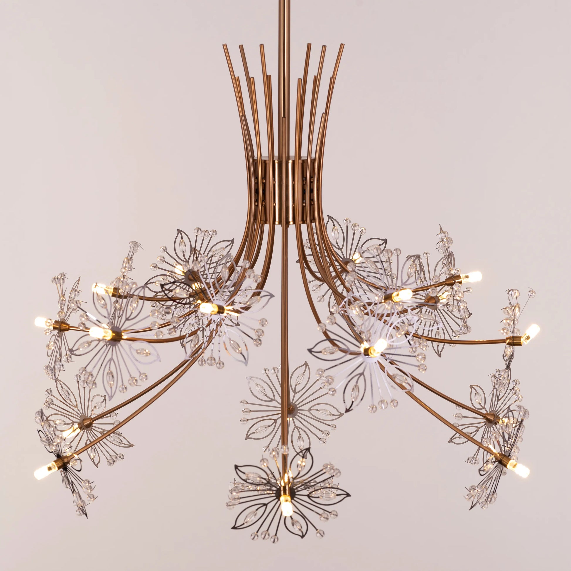 Elegant gold and crystal chandelier with cascading glass droplets