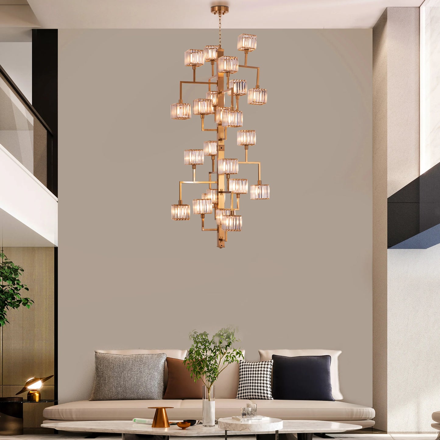 Watch The Throne large vertical gold and crystal chandelier illuminating a grand multi-story foyer with its cascading light