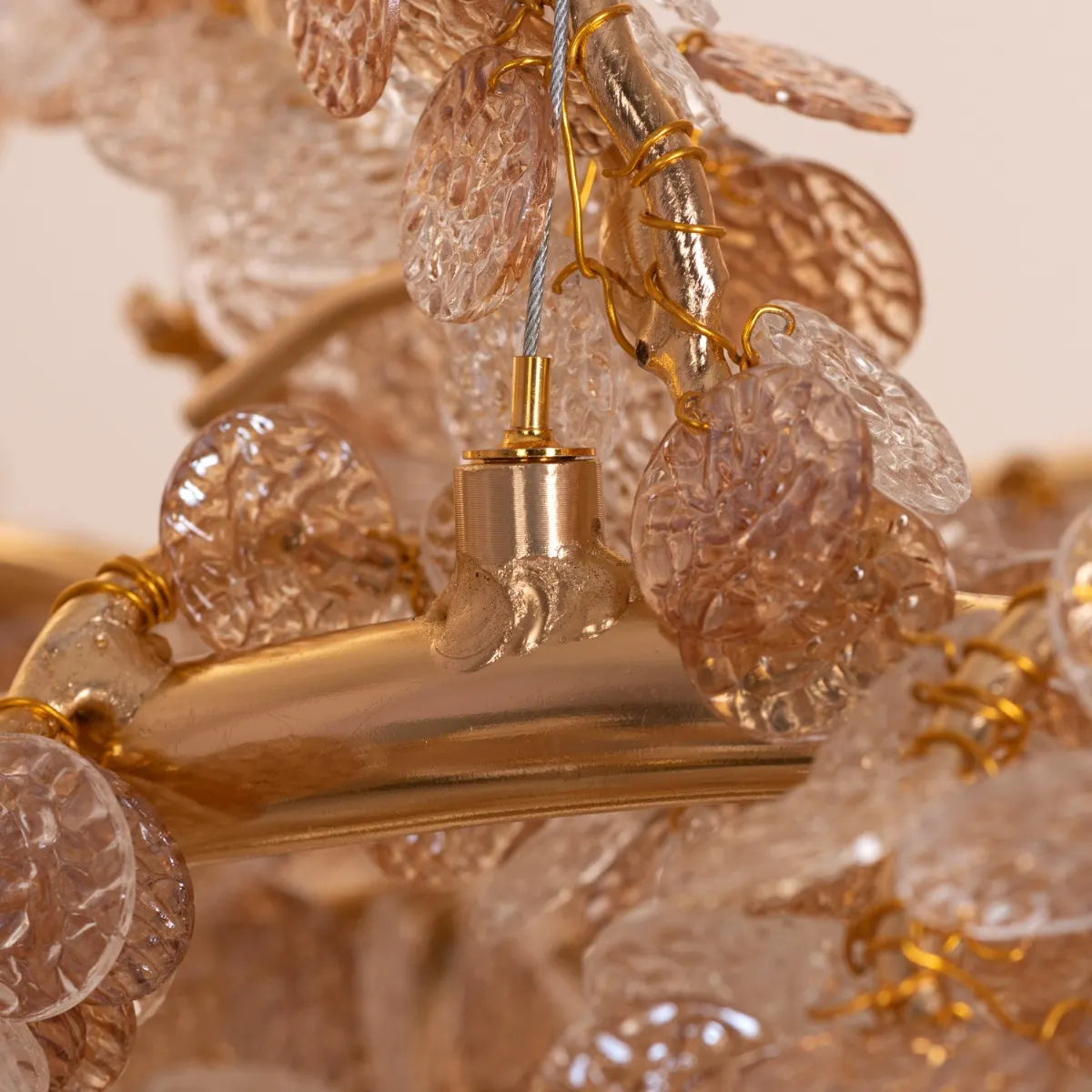 California Tree Branch Crystal Chandelier illuminating a luxurious dining room.