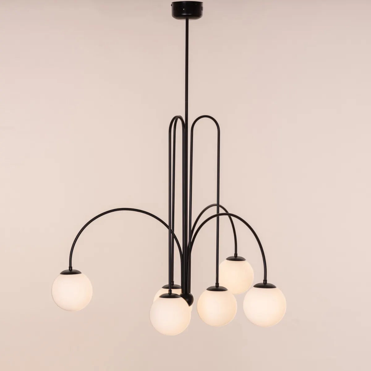 Forever Young Chandelier: A large, black chandelier with dimmable LED lighting and remote control.