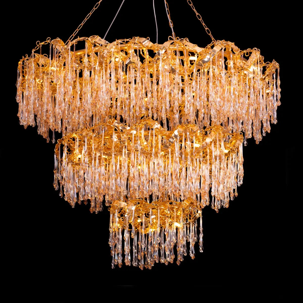 Large gold 3-layer crystal chandelier resembling a sparkling galaxy