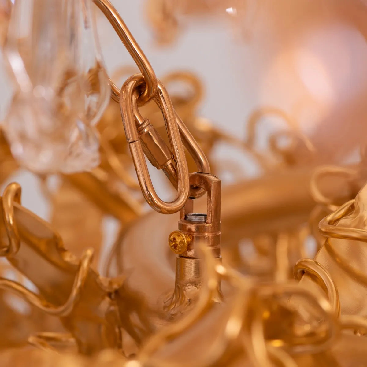 Large gold 3-layer crystal chandelier resembling a sparkling galaxy