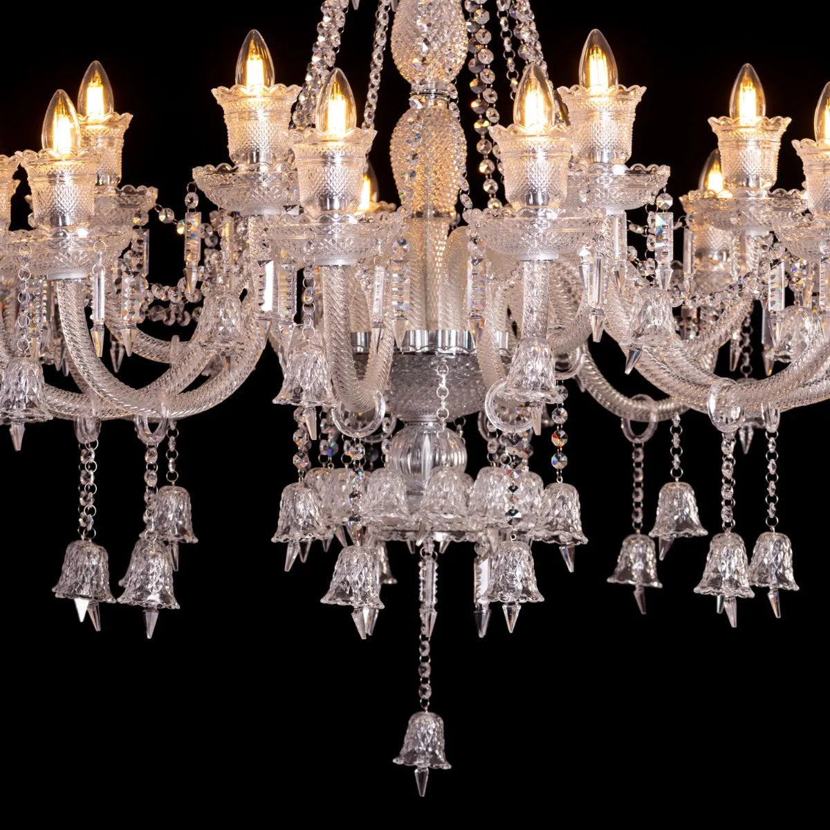 Large chrome Rules The Room Grand crystal chandelier illuminating a luxurious hotel lobby with dazzling brilliance