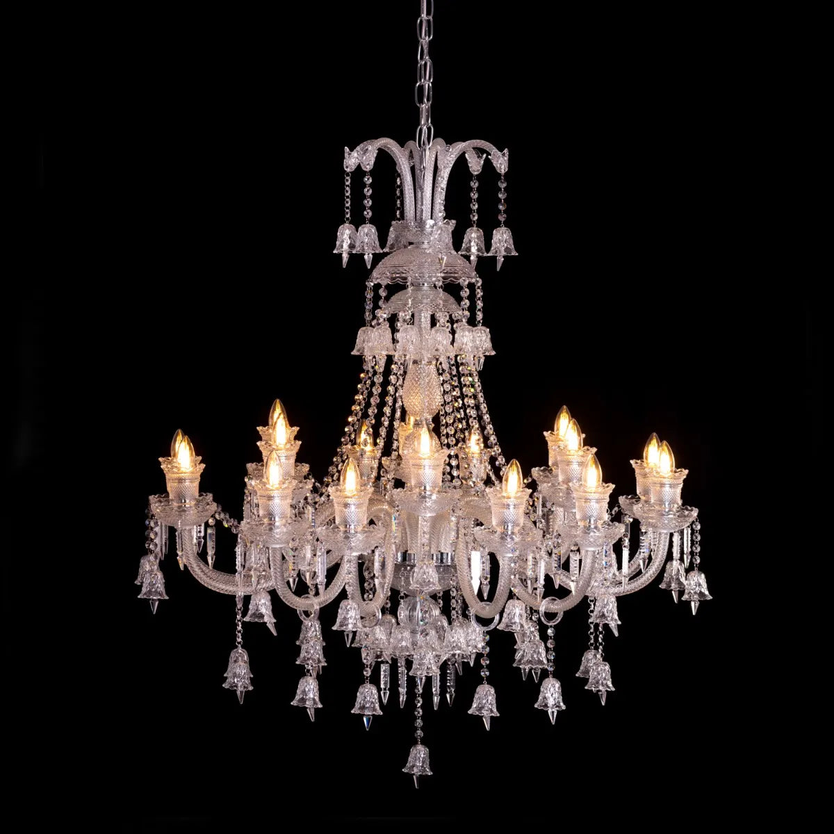 Large chrome Rules The Room Grand crystal chandelier illuminating a luxurious hotel lobby with dazzling brilliance