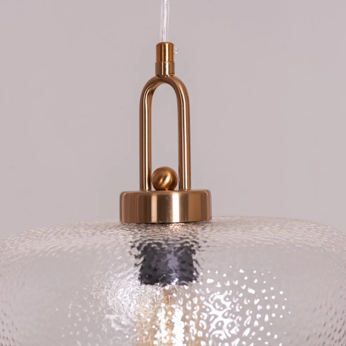 Modern Take Me Traveling Pendant Light with Stout Textured Glass and Elegant Gold Detailing