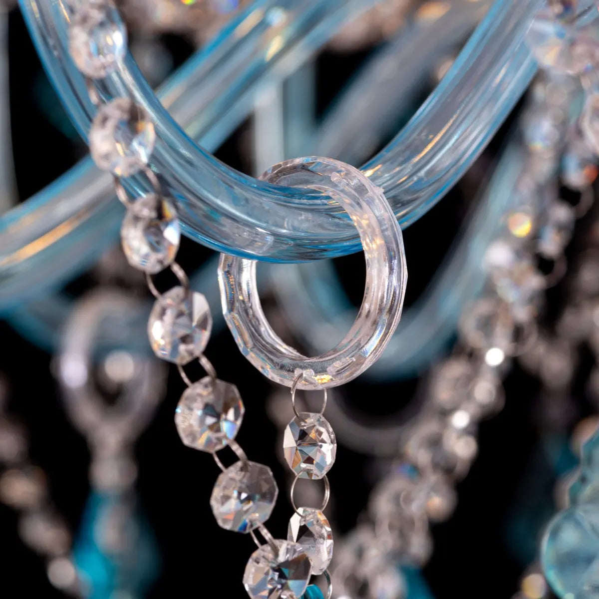 Georgian Glamour Grand large aqua blue crystal chandelier illuminating a grand entryway