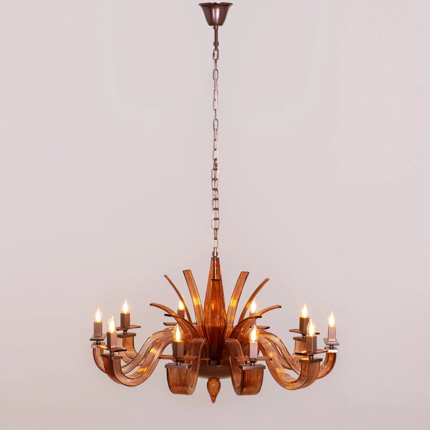 Large brown textured glass chandelier with overlapping layers creating a velvet-like appearance