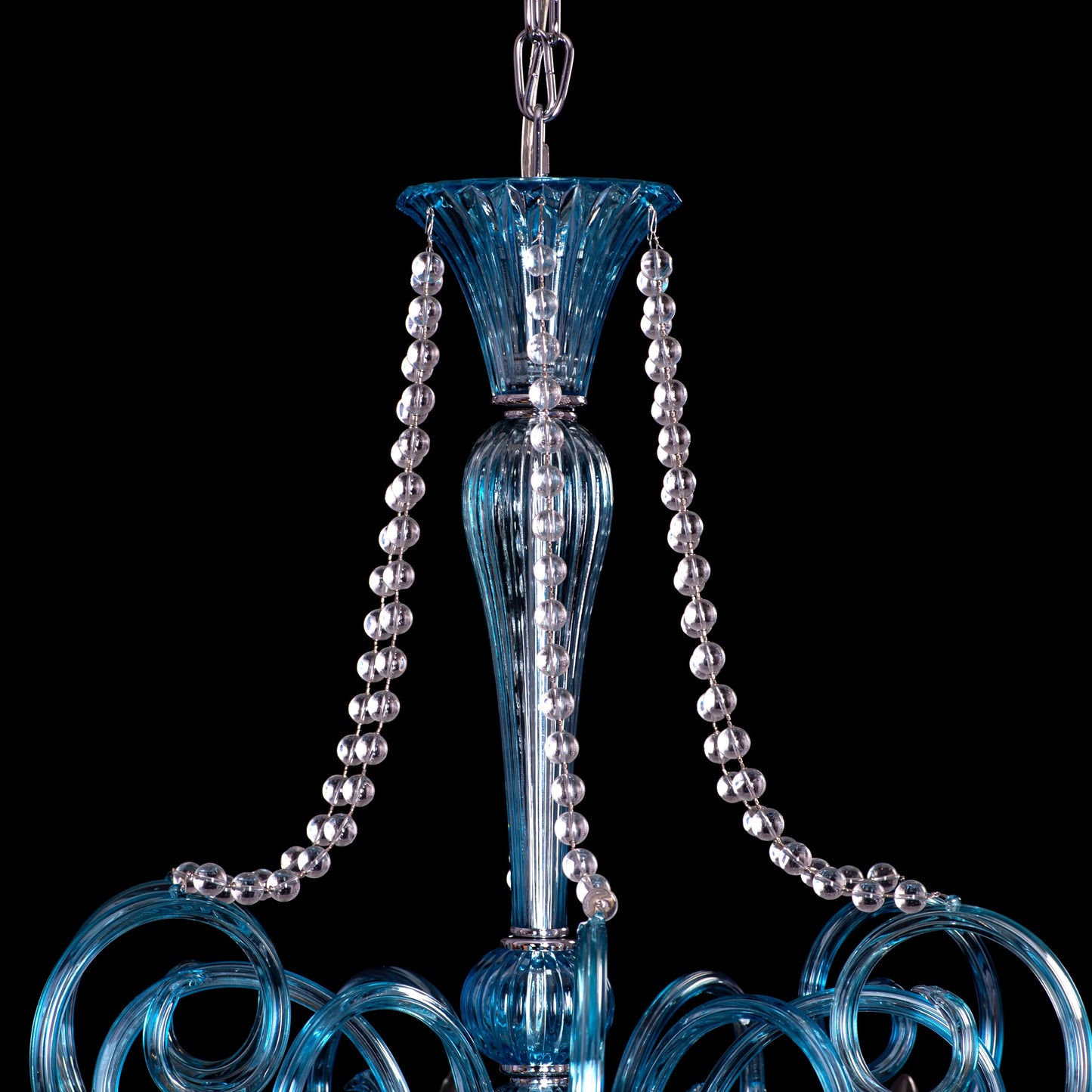 Grecian Glamour large blue textured glass chandelier illuminating a luxurious living room