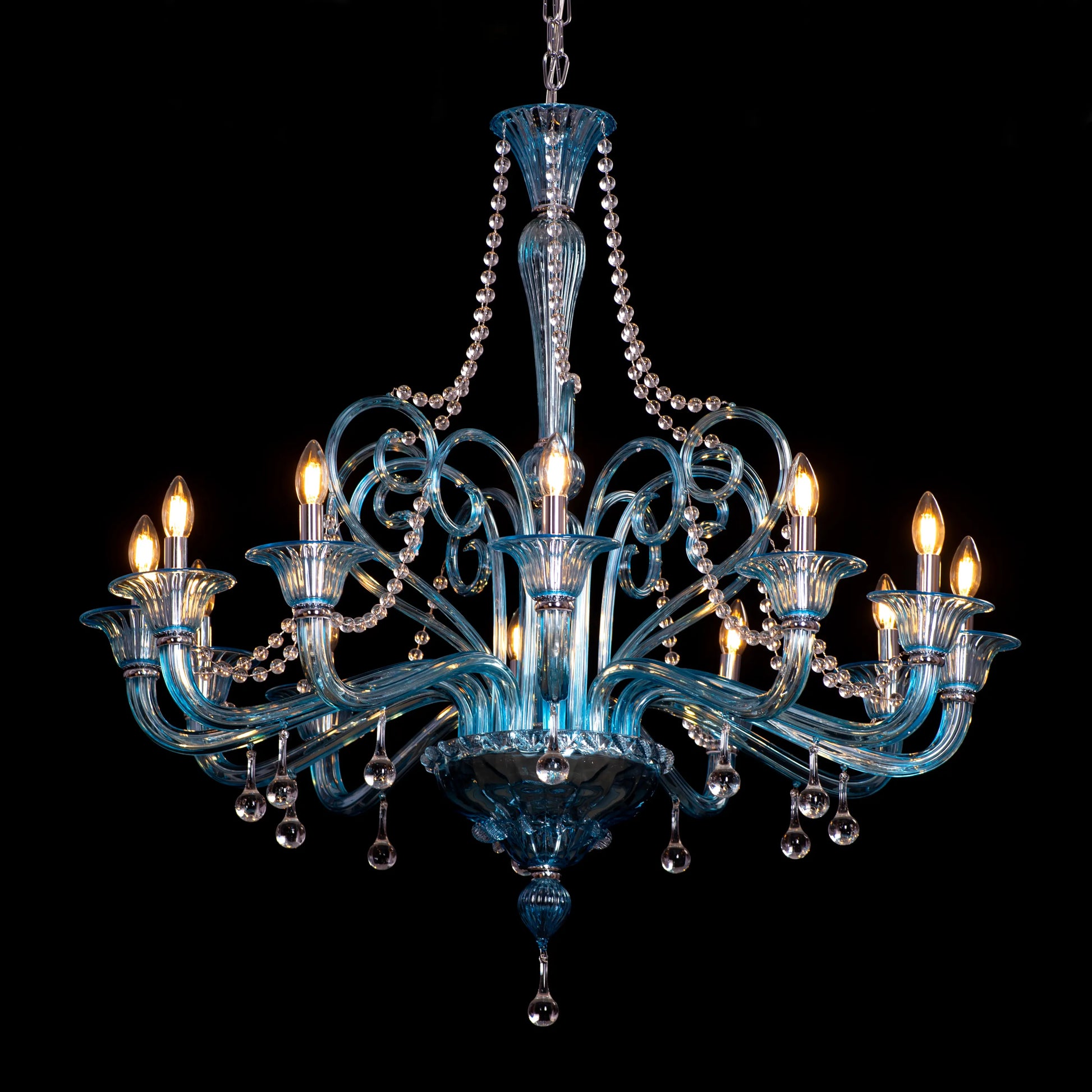 Grecian Glamour large blue textured glass chandelier illuminating a luxurious living room