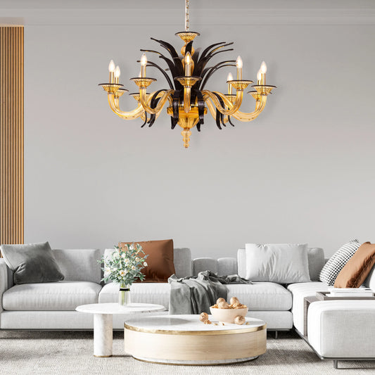 Large "Melodrama" chandelier with amber textured glass and black metal frame, dramatically illuminated in a spacious room.