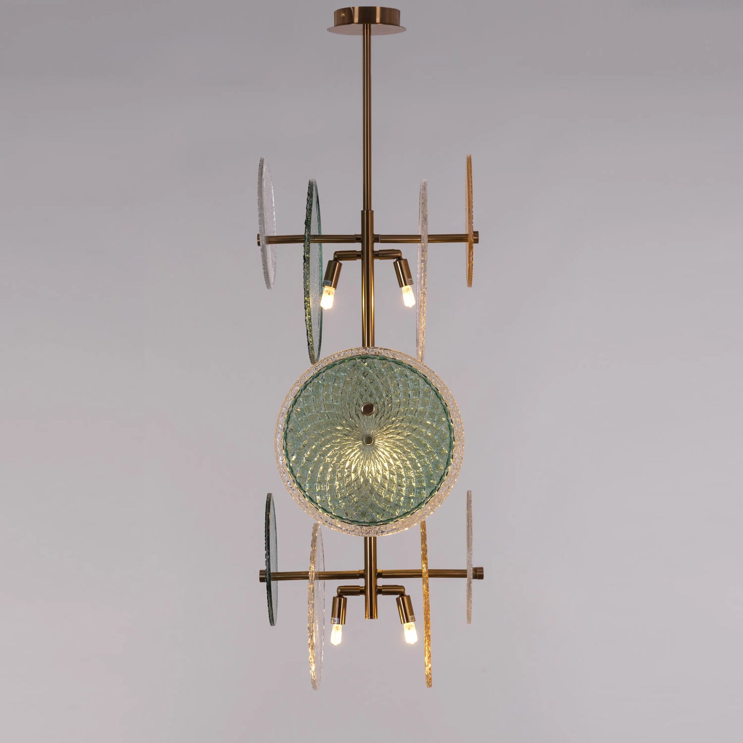 Trendsetter medium gold chandelier illuminating a modern living room with its avant-garde design