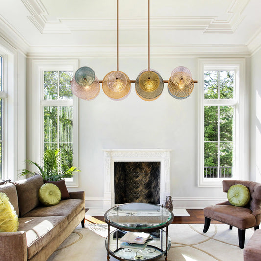 Large horizontal gold chandelier with textured surface in luxurious setting