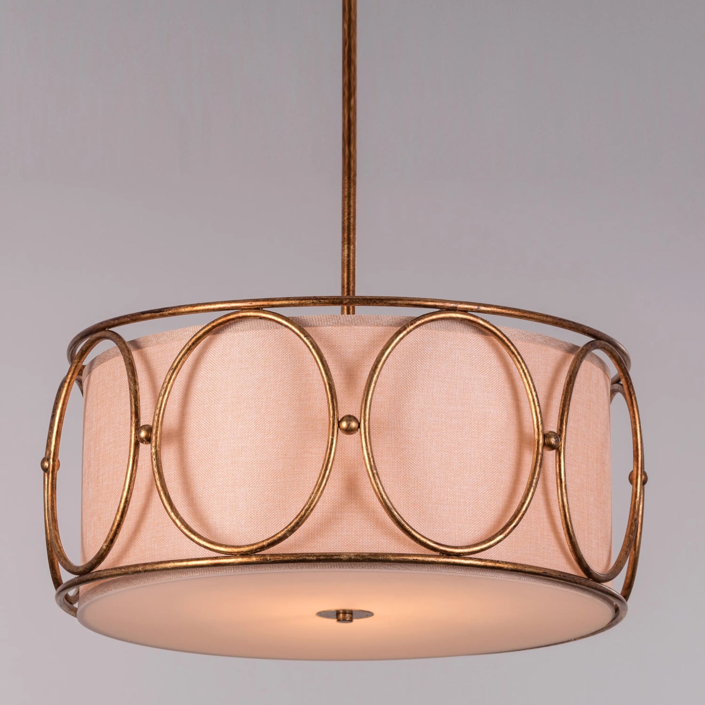 A sophisticated pendant light named 'Play Our Song,' featuring a stunning gold foil gilded finish that exudes elegance and luxury. The light's design incorporates smooth curves and a modern silhouette, enhancing its artistic appeal. When illuminated, the gold foil creates a warm, inviting glow, making it a perfect centerpiece for adding glamour and style to any room