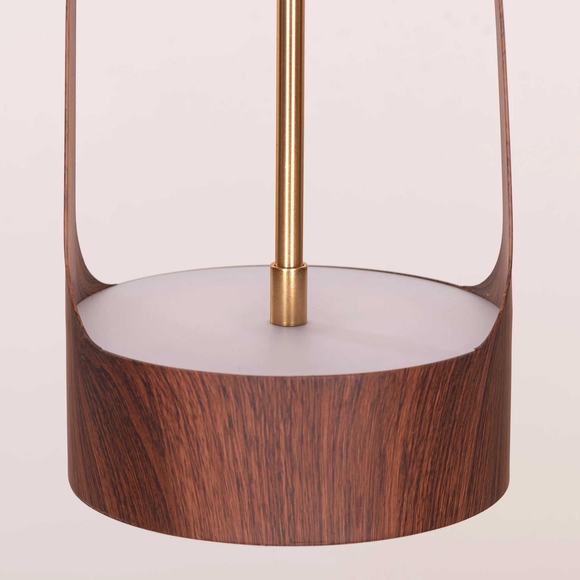 A modern pendant light named 'Smart Move,' featuring a sleek wooden frame with a built-in LED light. The minimalist design highlights the natural grain of the wood, offering a clean and contemporary look. The integrated LED provides efficient, bright illumination while the wooden element adds warmth and sophistication to any space.