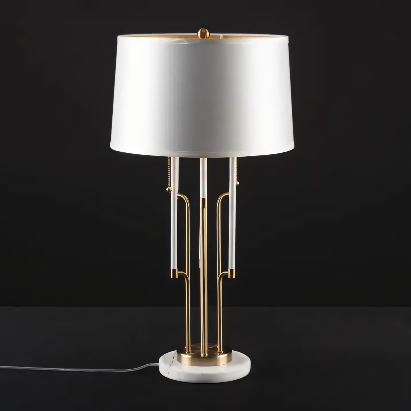 Luxurious matte gold finish of the Standstill Lamp's metal frame